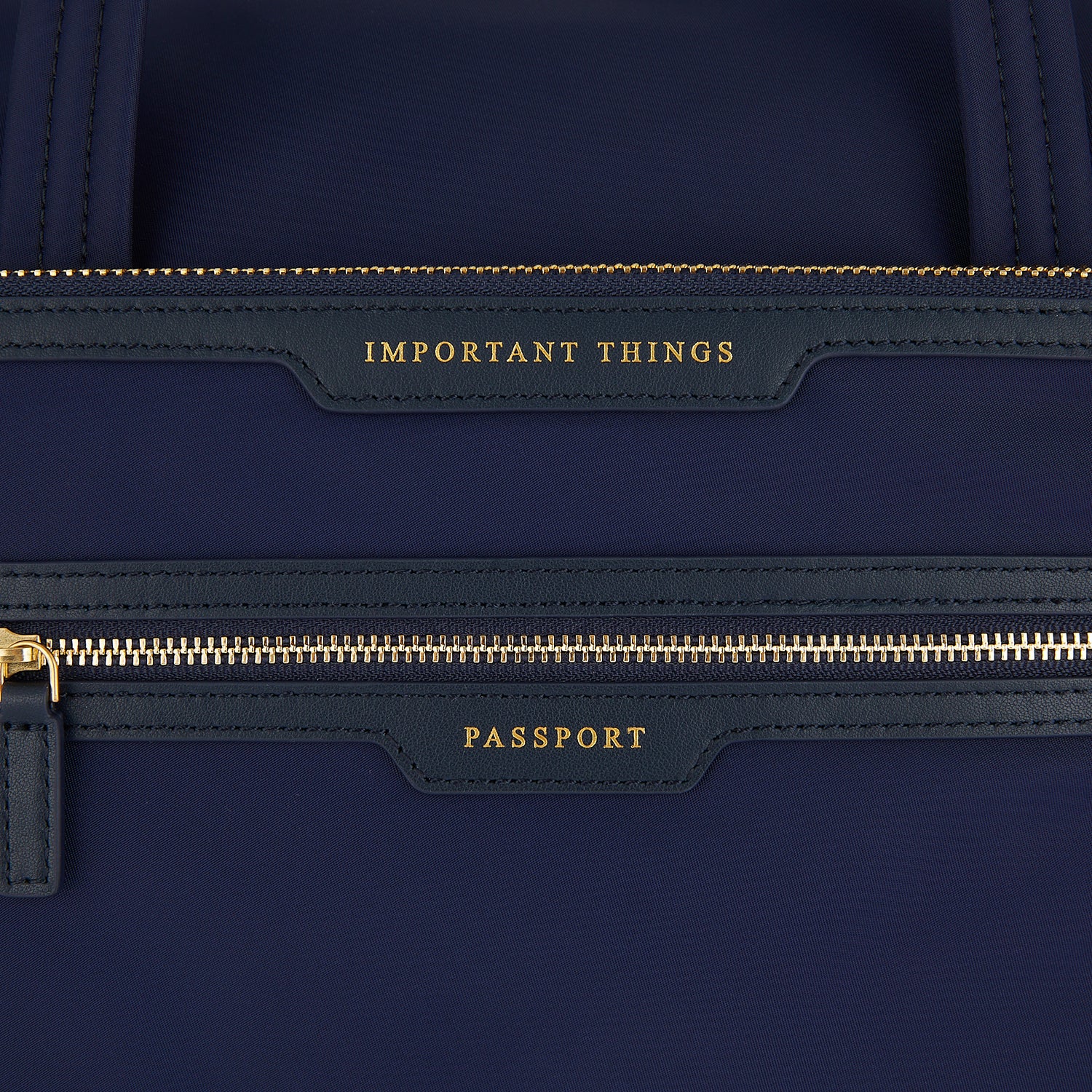 In-Flight Travel Bag -

                  
                    Regenerated Econyl® in Marine -
                  

                  Anya Hindmarch UK
