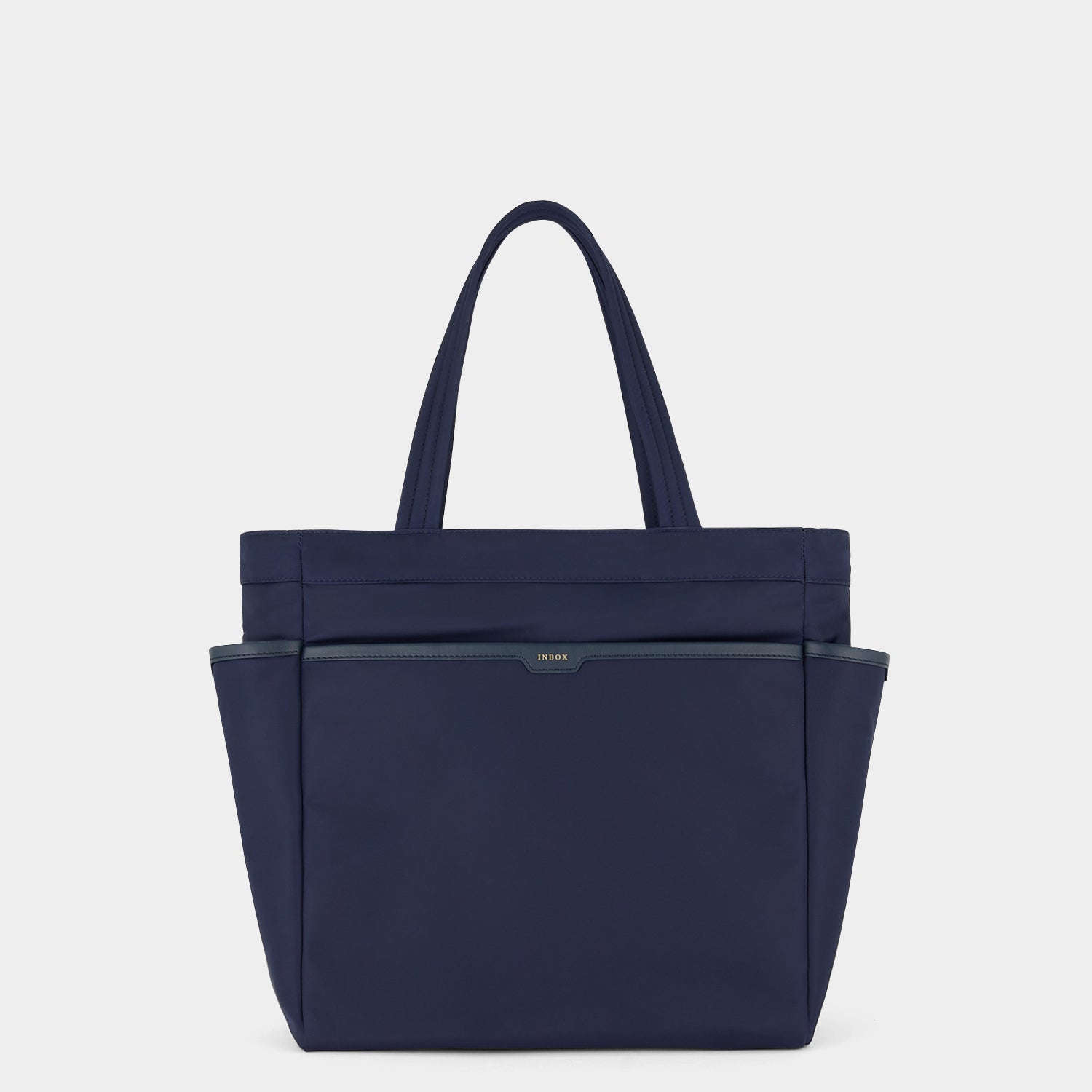 Commuter Tote -

                  
                    Regenerated Econyl® in Marine -
                  

                  Anya Hindmarch UK
