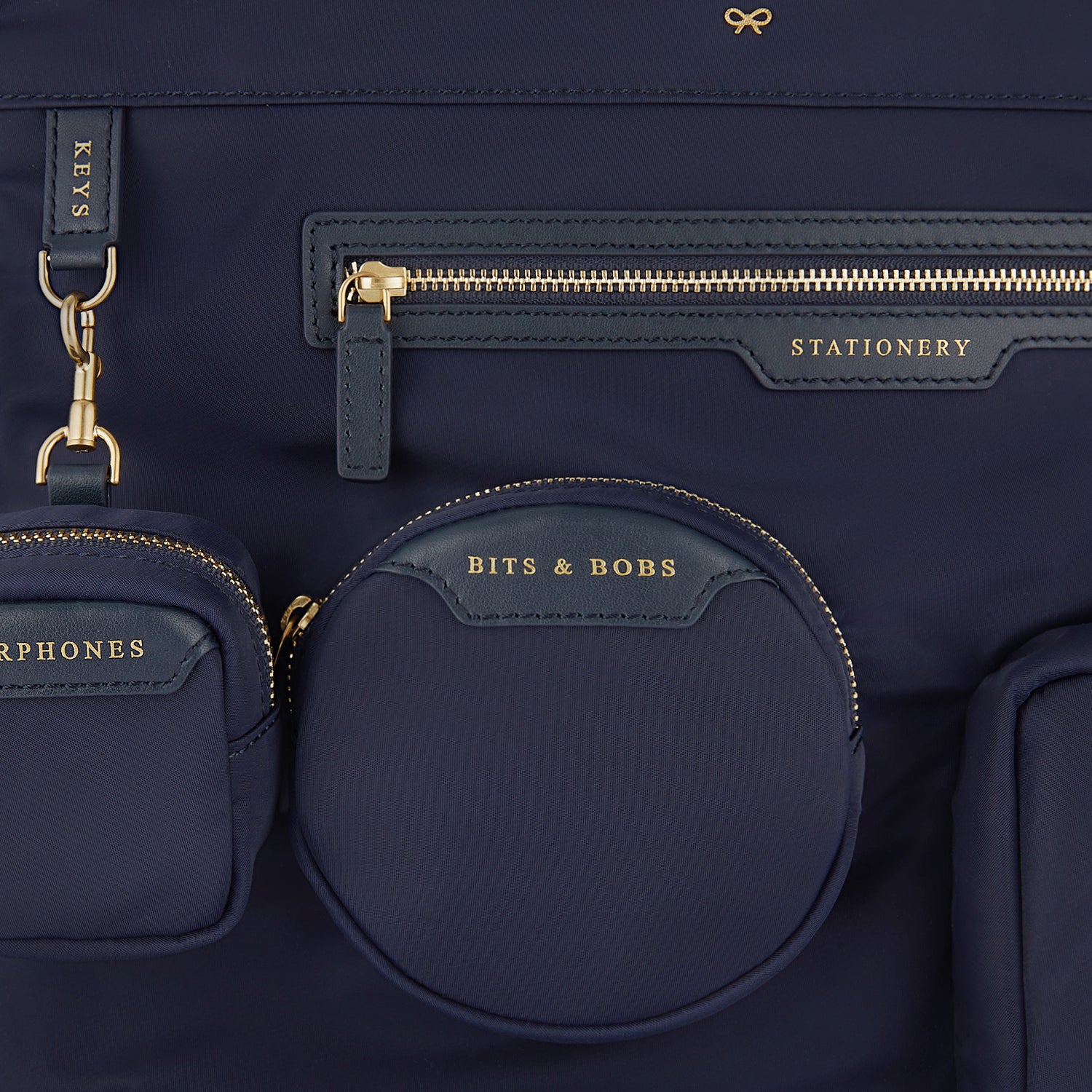 Commuter Tote -

                  
                    Regenerated Econyl® in Marine -
                  

                  Anya Hindmarch UK
