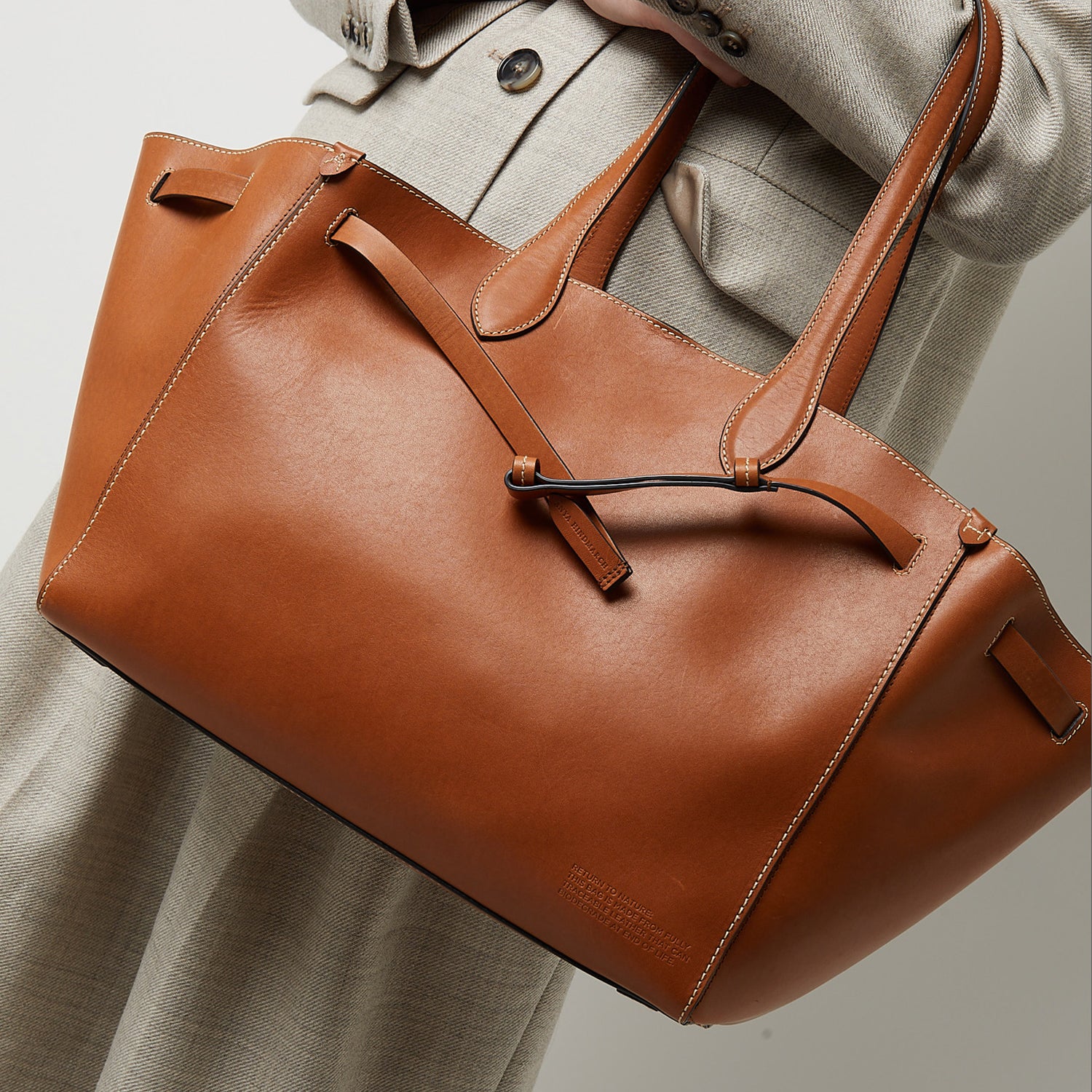 Return to Nature Tote -

                  
                    Compostable Leather in Tan -
                  

                  Anya Hindmarch UK
