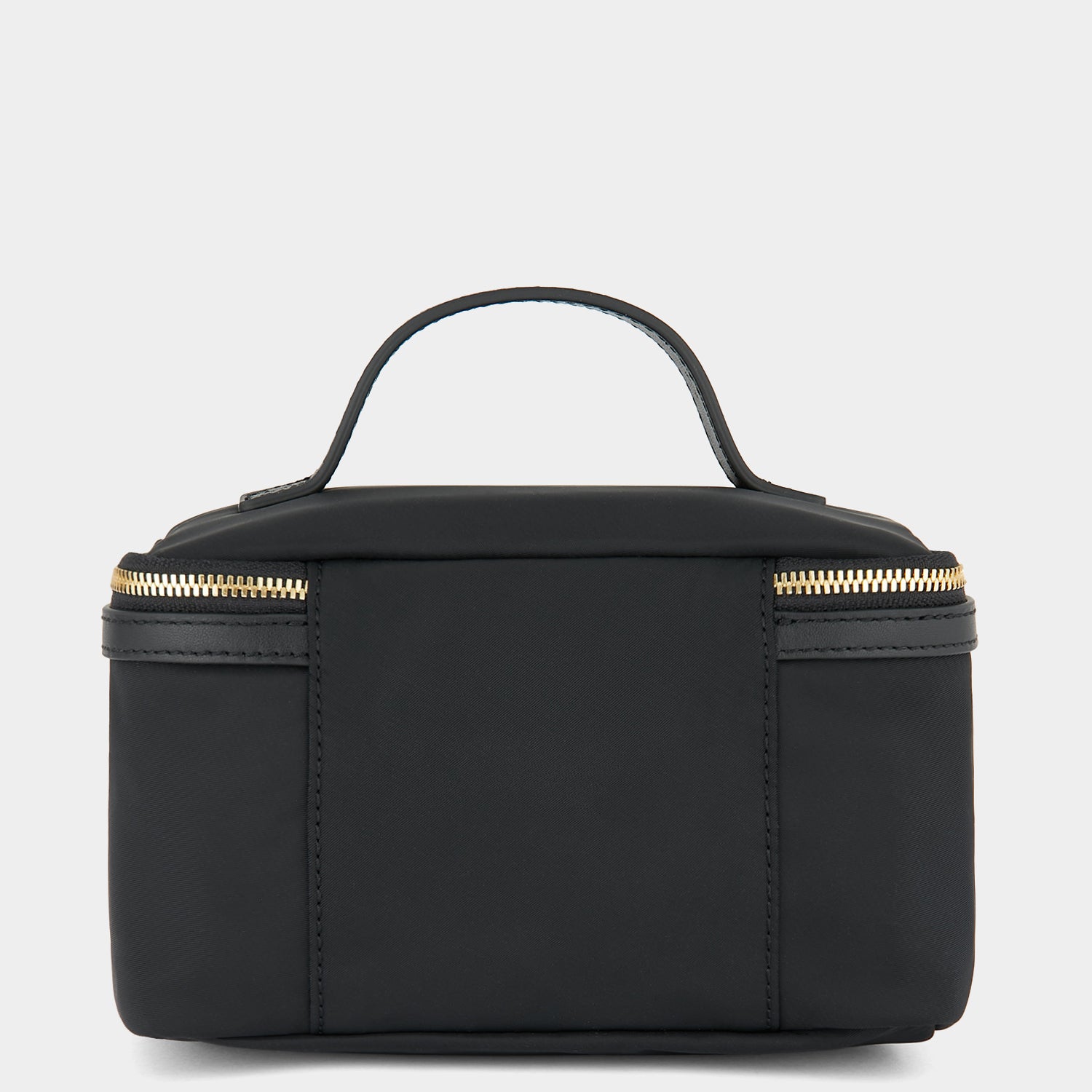 Small Vanity Kit -

                  
                    Recycled Nylon in Black -
                  

                  Anya Hindmarch UK
