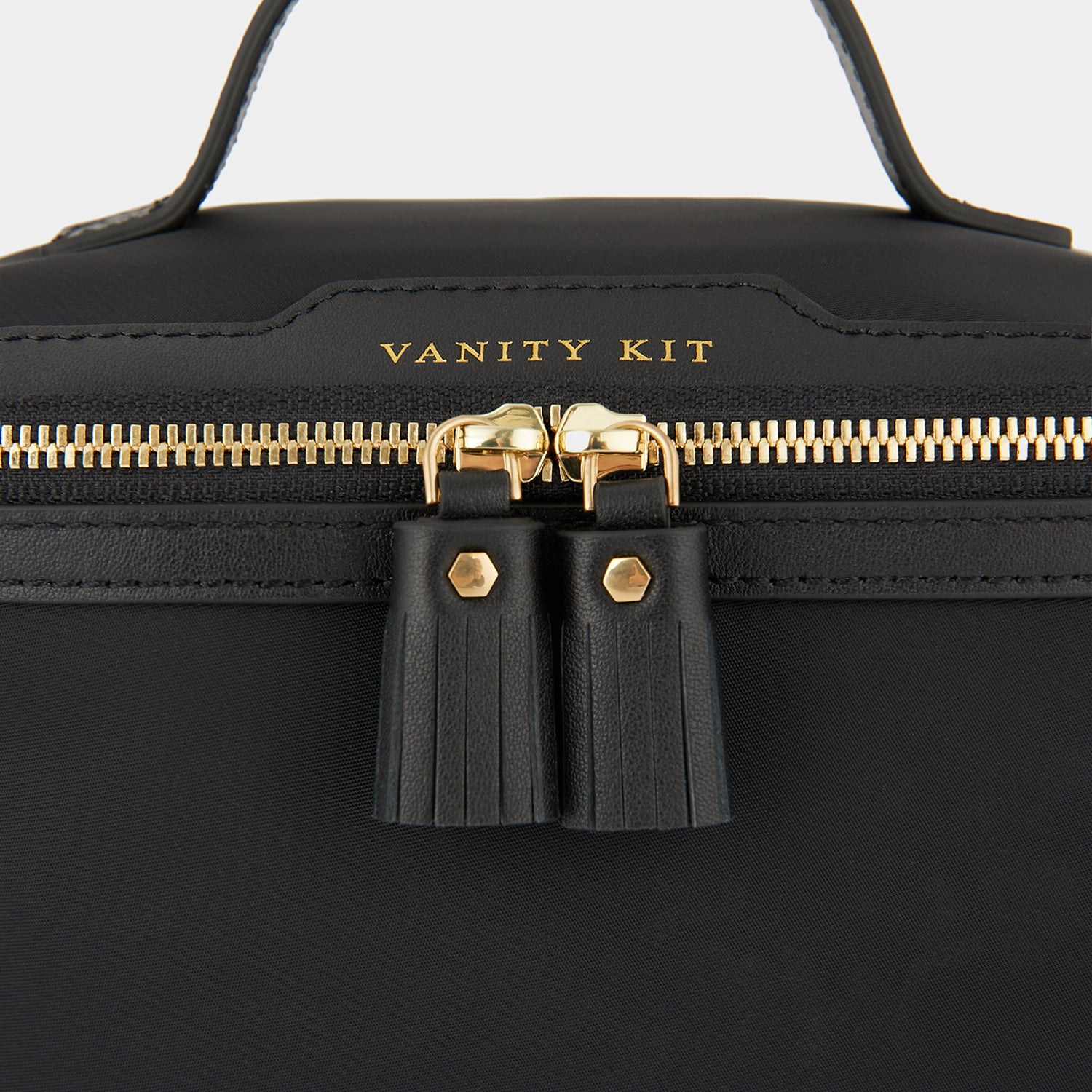 Small Vanity Kit -

                  
                    Recycled Nylon in Black -
                  

                  Anya Hindmarch UK
