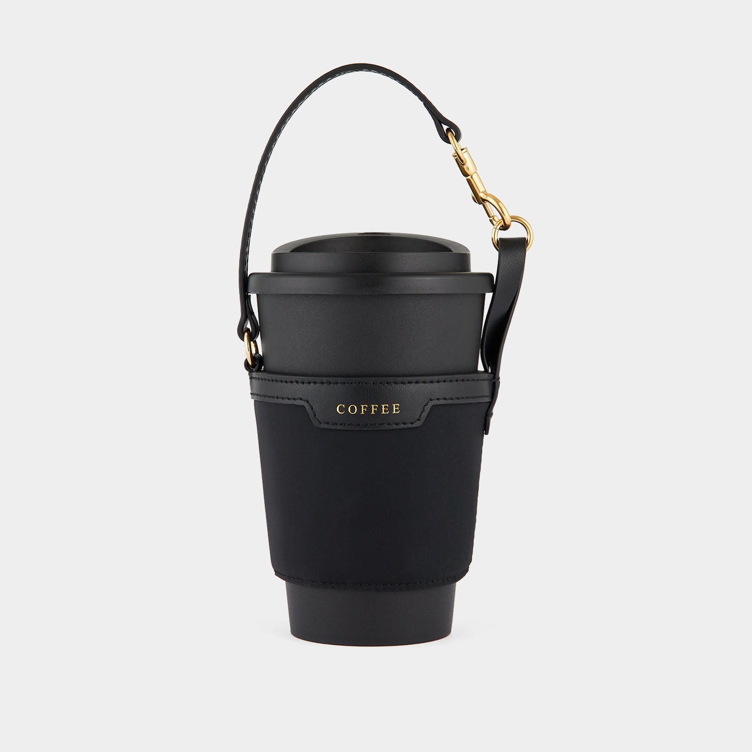 Cup Holder -

                  
                    ECONYL® Regenerated Nylon in Black -
                  

                  Anya Hindmarch UK
