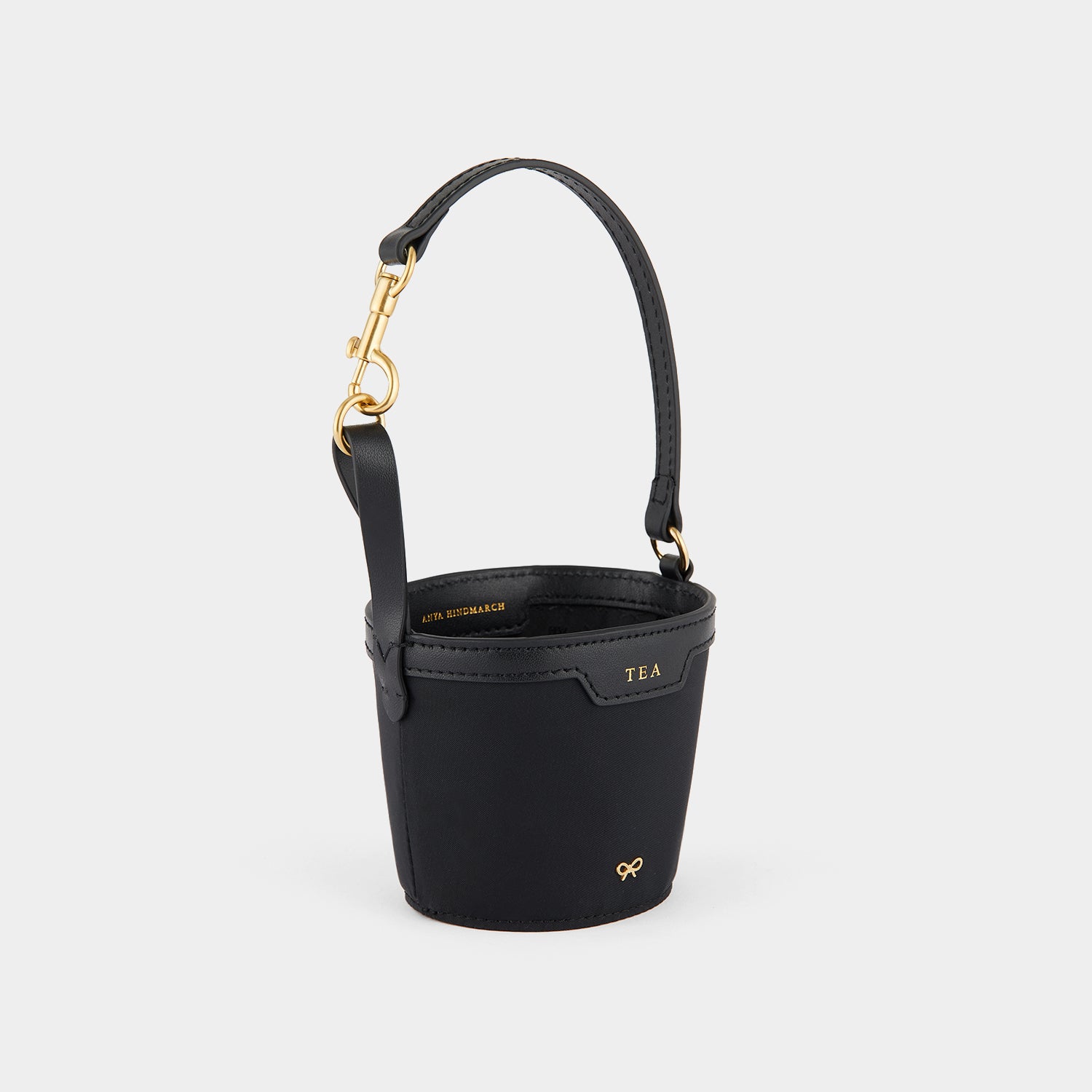 Cup Holder -

                  
                    ECONYL® Regenerated Nylon in Black -
                  

                  Anya Hindmarch UK
