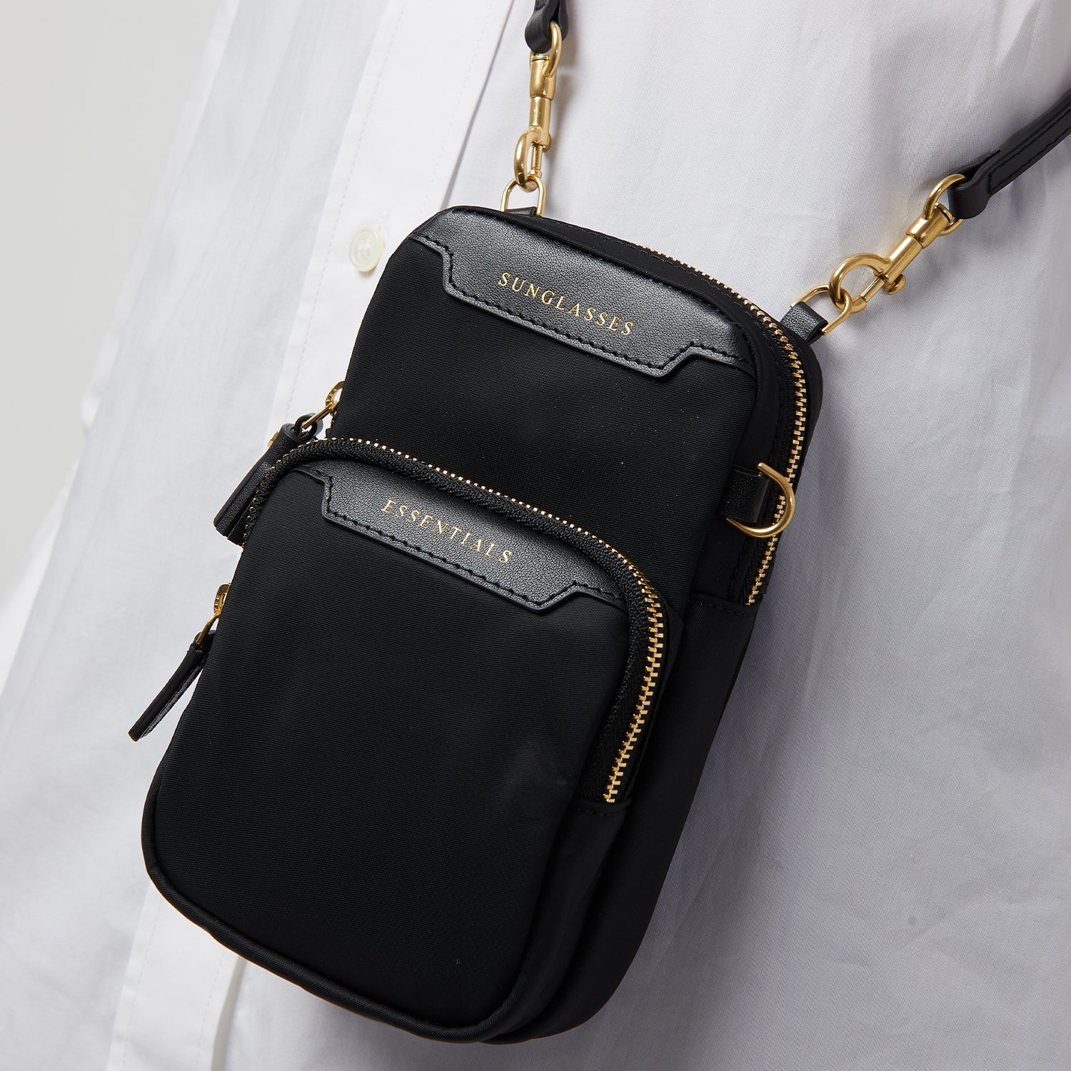 Essentials Cross-body -

                  
                    ECONYL® Regenerated Nylon in Black -
                  

                  Anya Hindmarch UK
