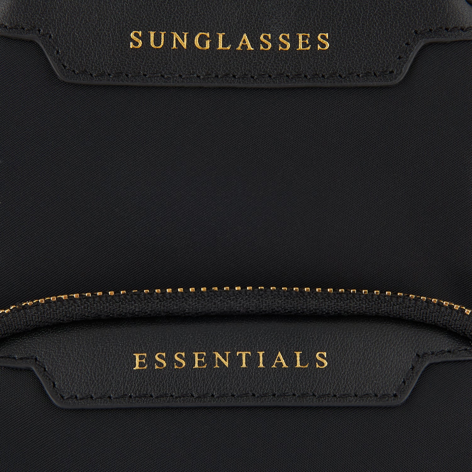 Essentials Cross-body -

                  
                    ECONYL® Regenerated Nylon in Black -
                  

                  Anya Hindmarch UK
