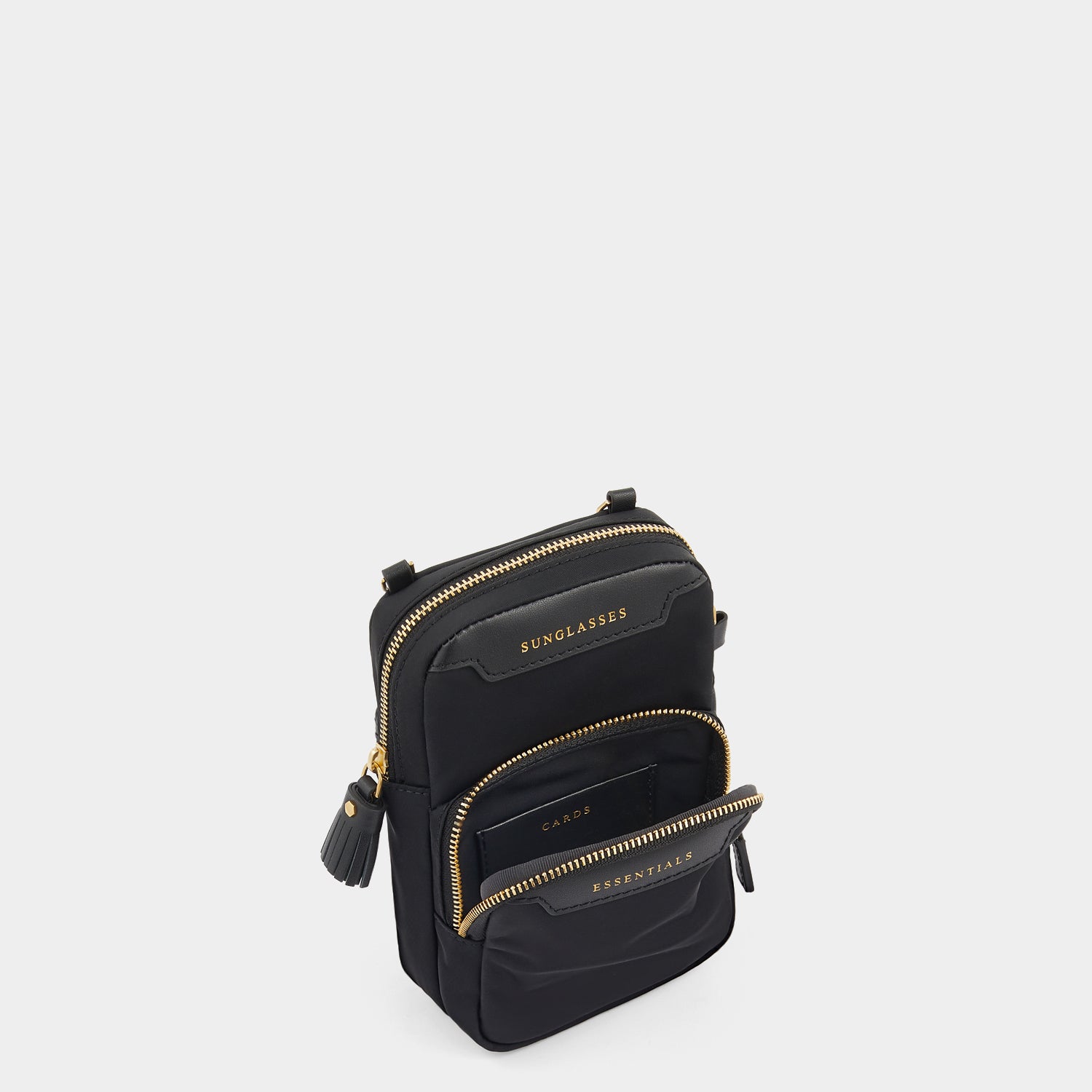 Essentials Cross-body -

                  
                    ECONYL® Regenerated Nylon in Black -
                  

                  Anya Hindmarch UK
