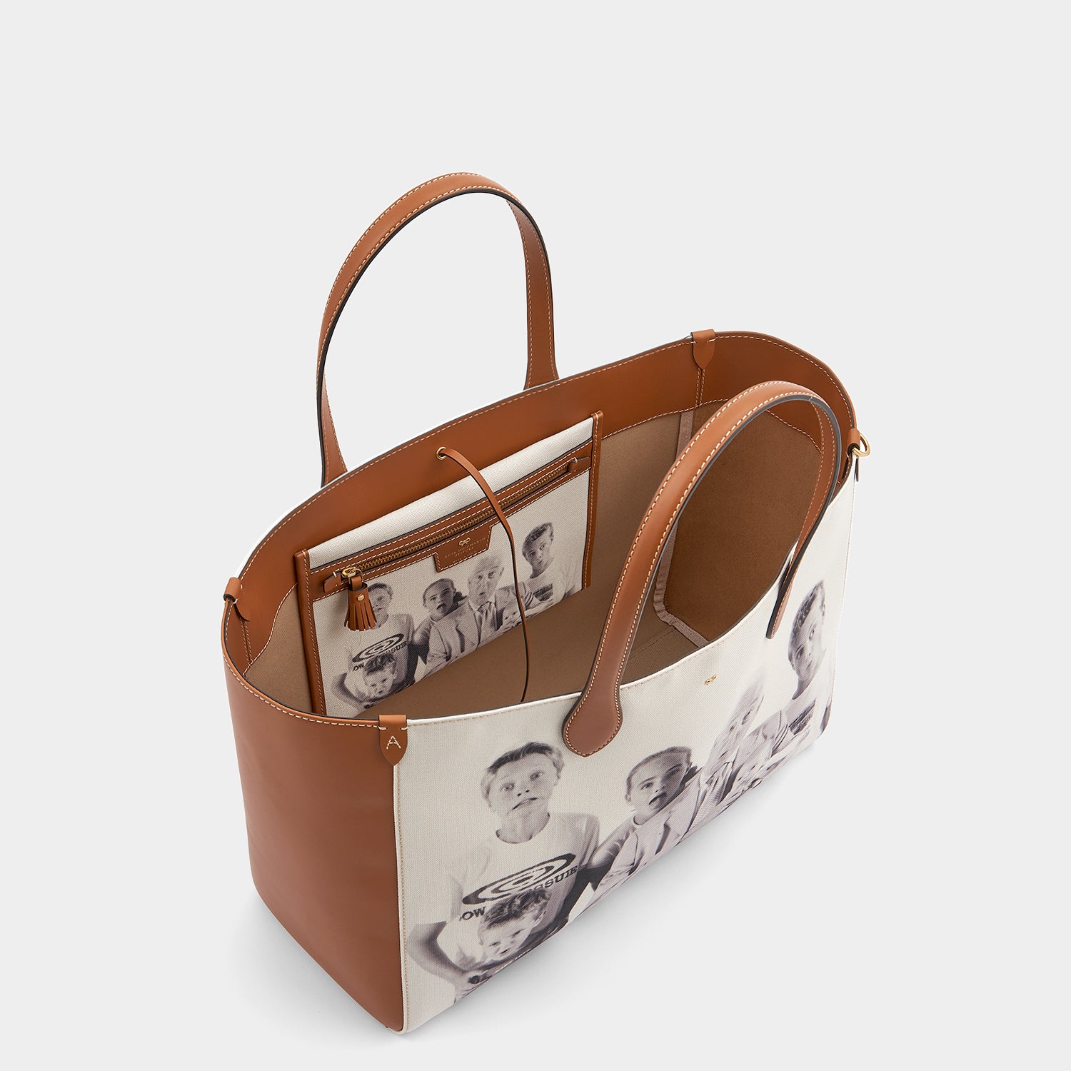 Be A Bag E/W Tote -

                  
                    Recyled Canvas in Tan -
                  

                  Anya Hindmarch UK
