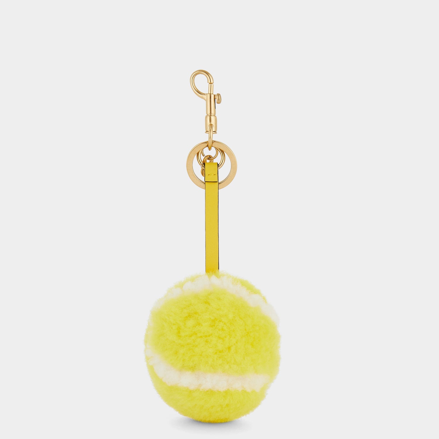 Tennis Charm -

                  
                    Shearling in Bright Lemon -
                  

                  Anya Hindmarch UK

