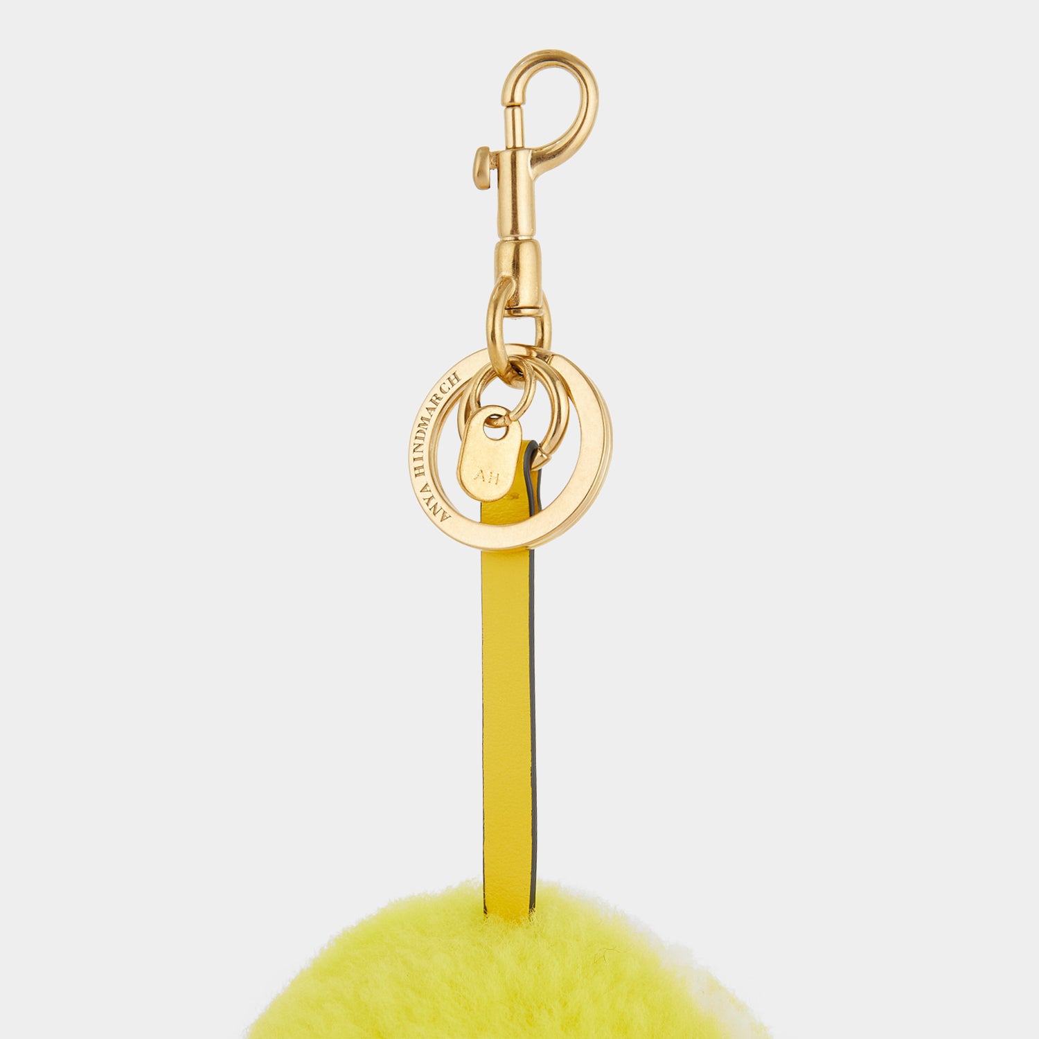 Tennis Charm -

                  
                    Shearling in Bright Lemon -
                  

                  Anya Hindmarch UK
