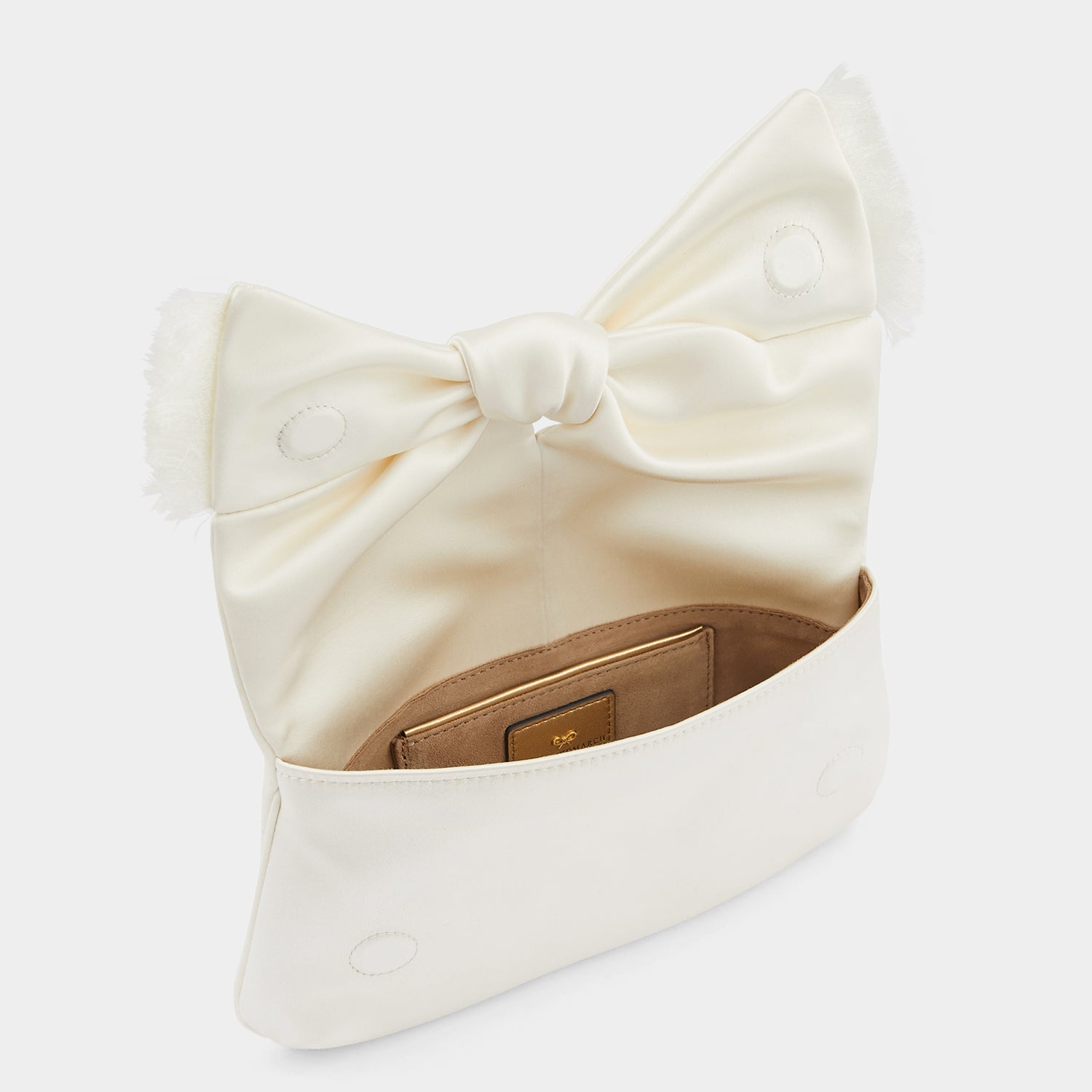 Bow Clutch -

                  
                    Double Satin in Ivory -
                  

                  Anya Hindmarch UK
