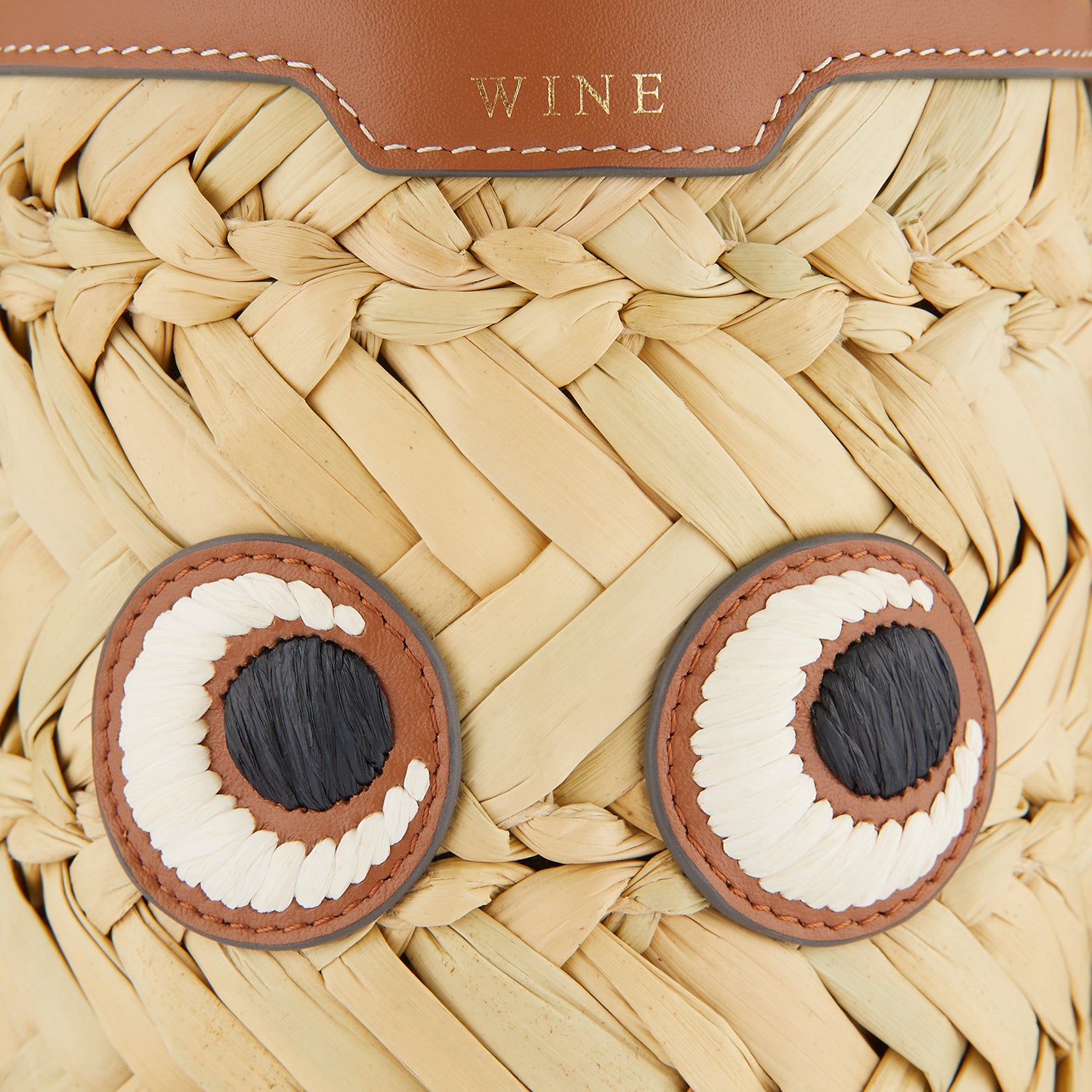 Eyes Wine Bottle Holder -

                  
                    Seagrass in Natural -
                  

                  Anya Hindmarch UK
