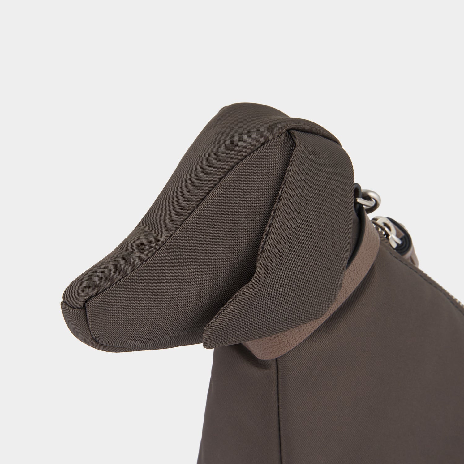 Dog Pouch -

                  
                    Regenerated ECONYL® in Taupe -
                  

                  Anya Hindmarch UK
