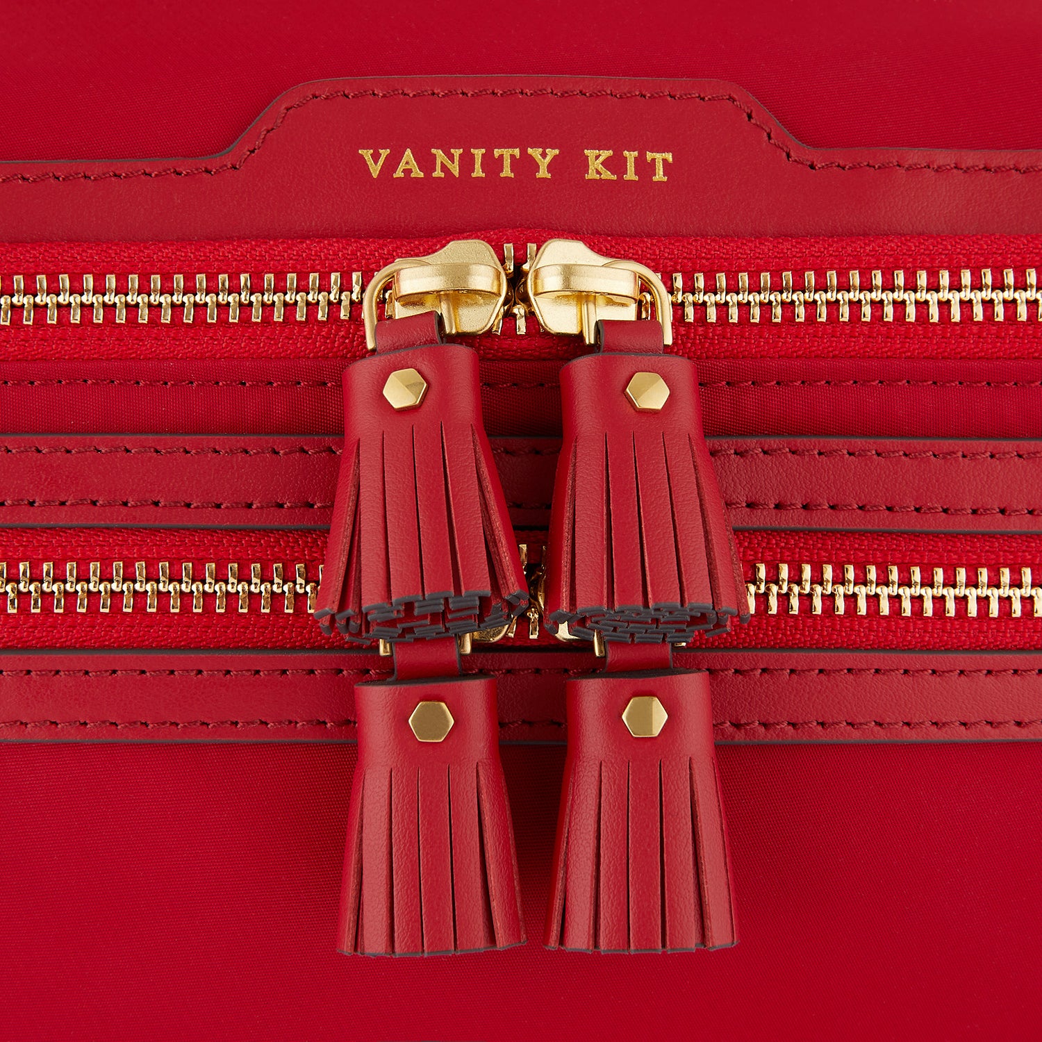 Vanity Kit -

                  
                    ECONYL® Regenerated Nylon in Red -
                  

                  Anya Hindmarch UK
