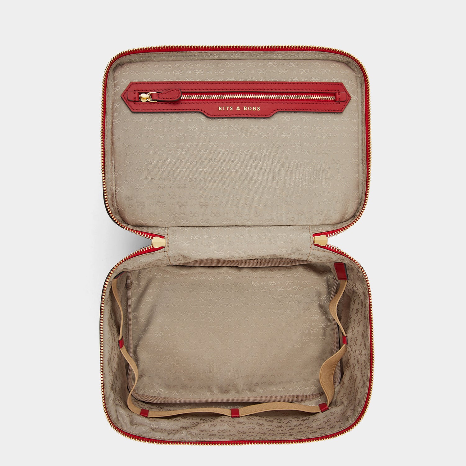 Vanity Kit -

                  
                    ECONYL® Regenerated Nylon in Red -
                  

                  Anya Hindmarch UK
