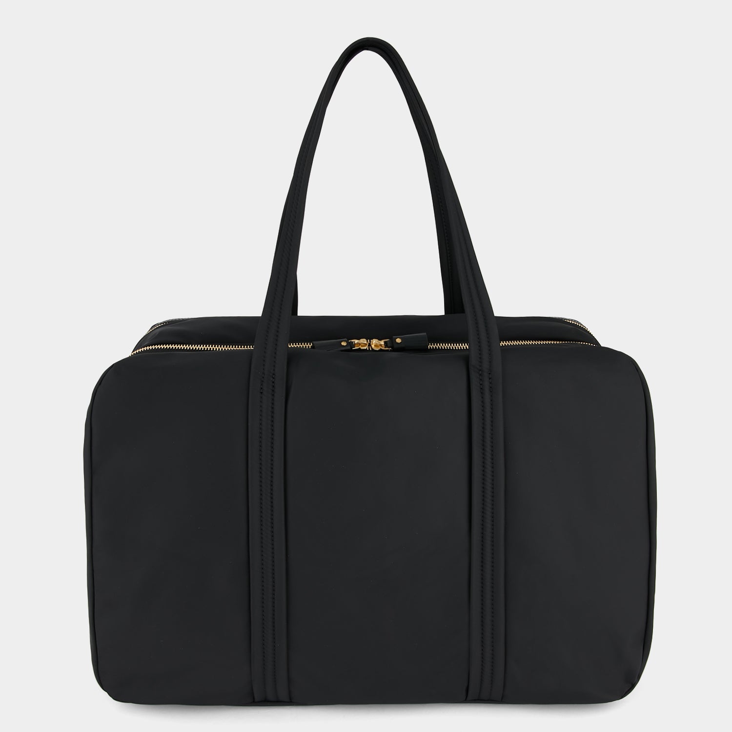 24 Hour Travel Bag -

                  
                    Econyl® Regenerated Nylon in Black -
                  

                  Anya Hindmarch UK
