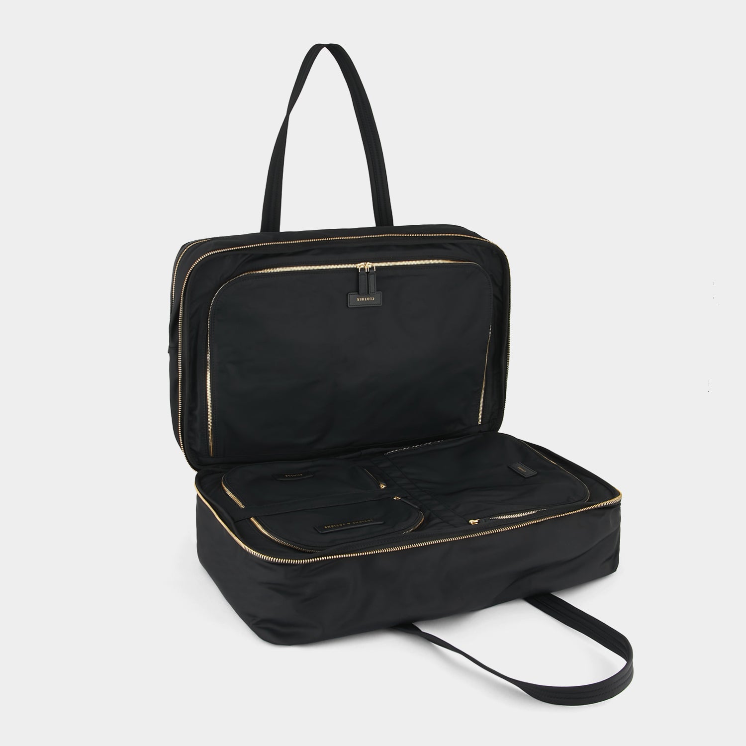 24 Hour Travel Bag -

                  
                    Econyl® Regenerated Nylon in Black -
                  

                  Anya Hindmarch UK
