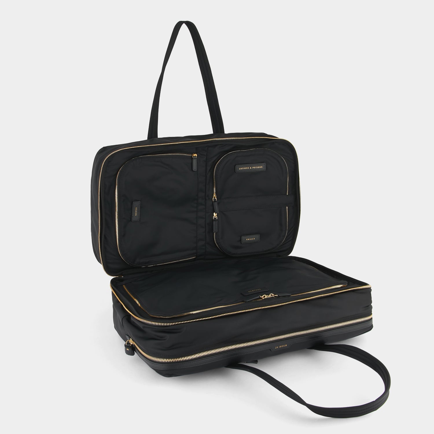 24 Hour Travel Bag -

                  
                    Econyl® Regenerated Nylon in Black -
                  

                  Anya Hindmarch UK
