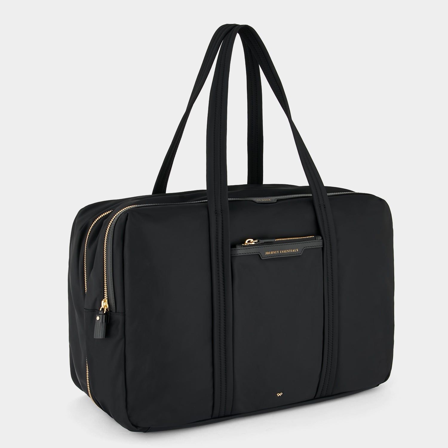 24 Hour Travel Bag -

                  
                    Econyl® Regenerated Nylon in Black -
                  

                  Anya Hindmarch UK
