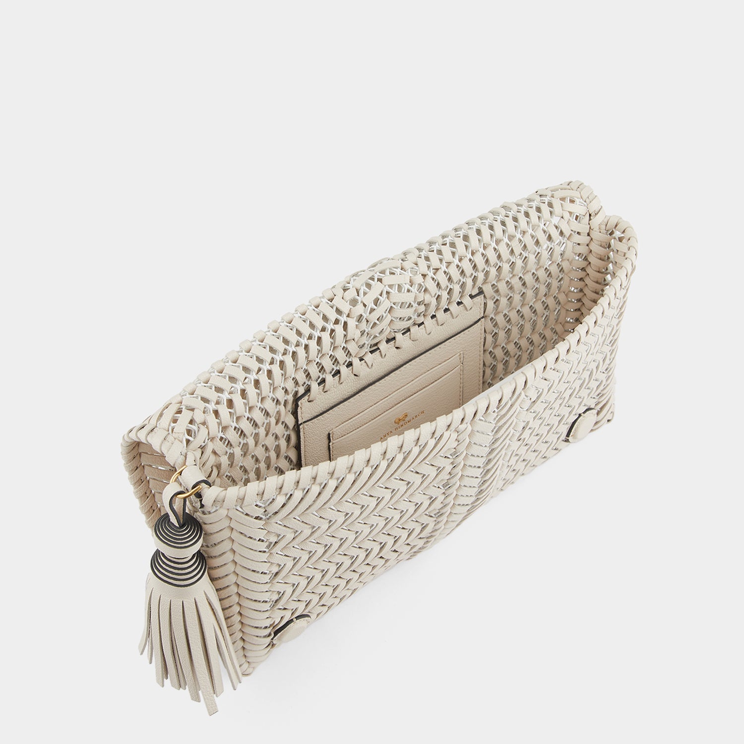 Neeson Tassel Clutch Large -

                  
                    Capra in Chalk -
                  

                  Anya Hindmarch UK
