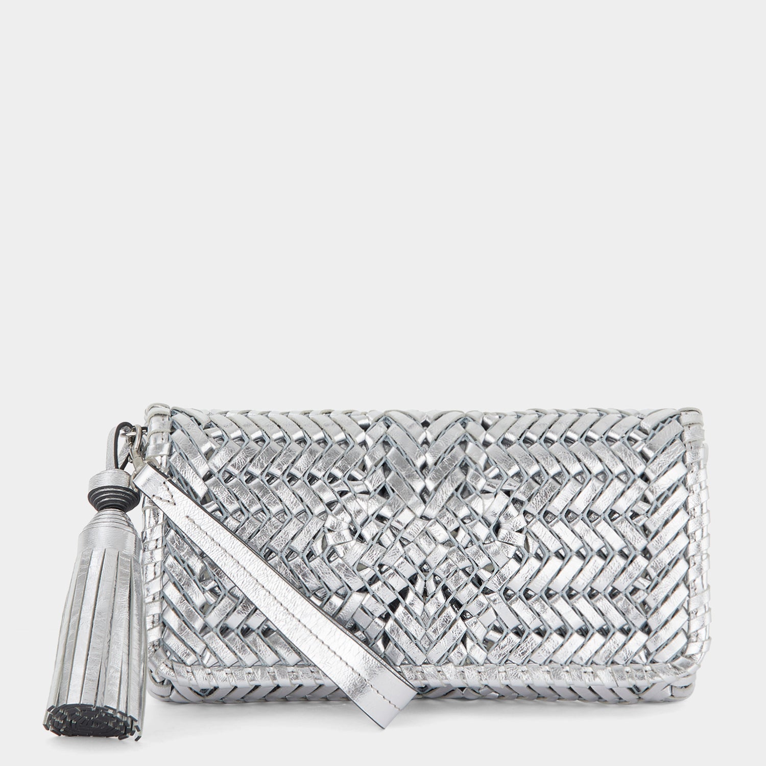 Neeson Tassel Clutch -

                  
                    Capra Leather in Silver -
                  

                  Anya Hindmarch UK
