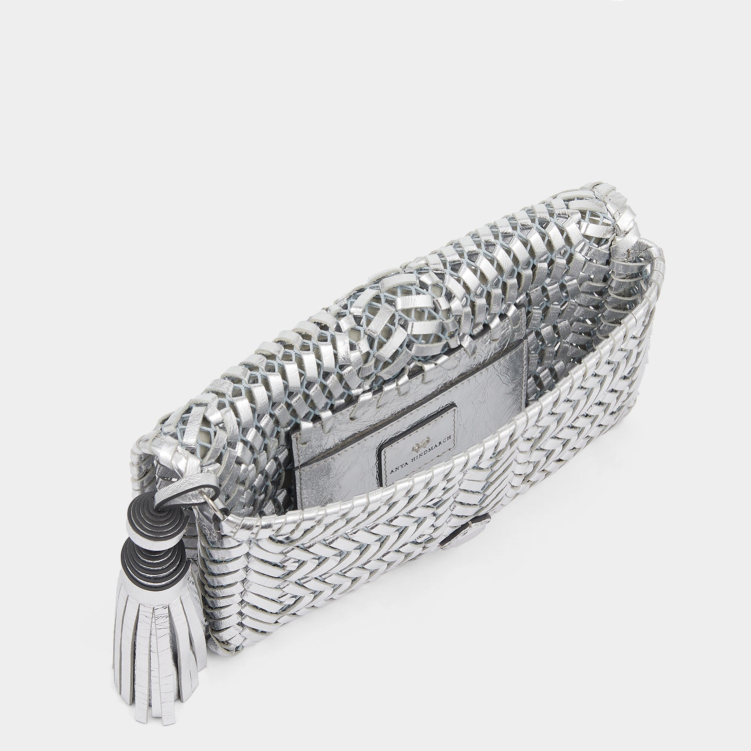 Neeson Tassel Clutch -

                  
                    Capra Leather in Silver -
                  

                  Anya Hindmarch UK
