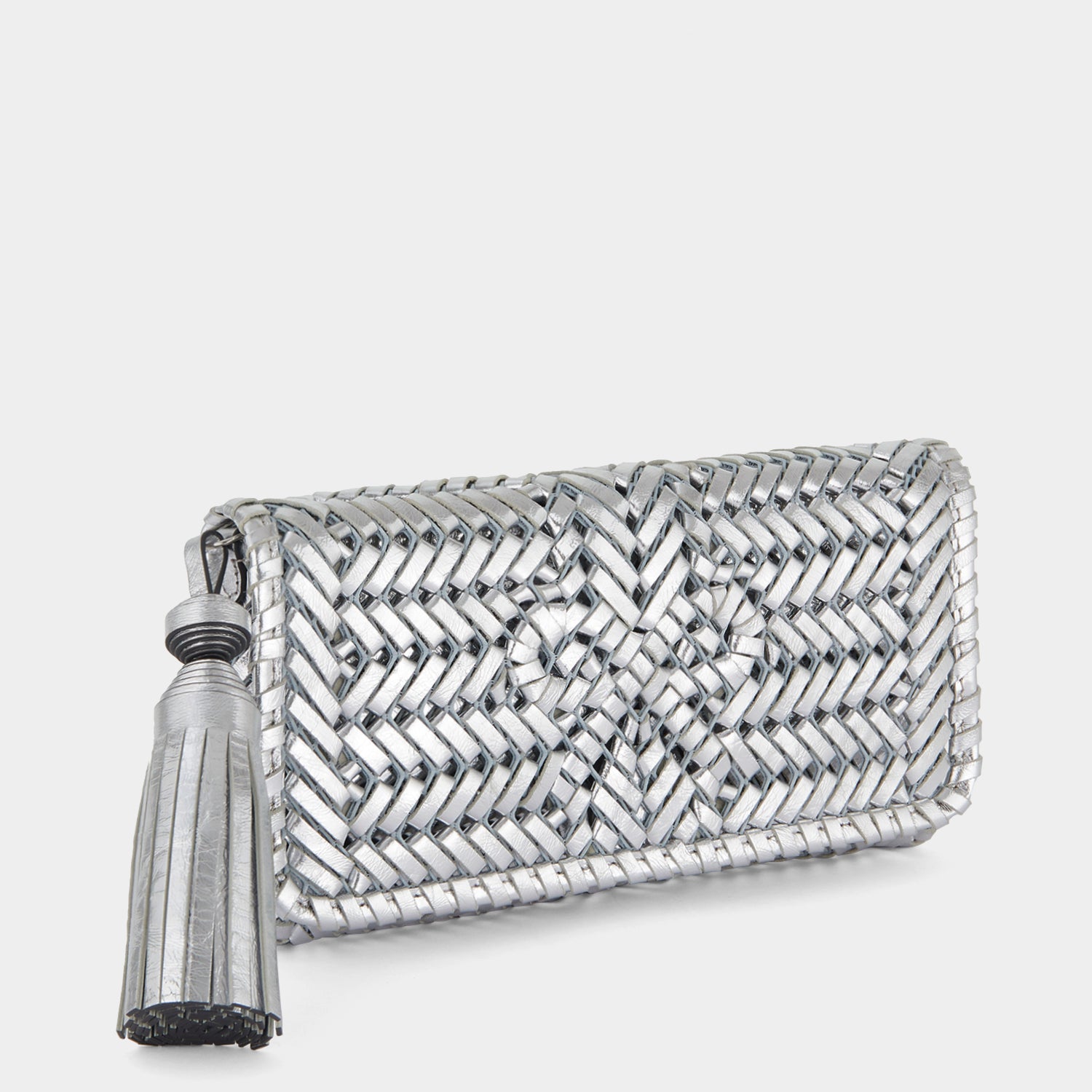 Neeson Tassel Clutch -

                  
                    Capra Leather in Silver -
                  

                  Anya Hindmarch UK
