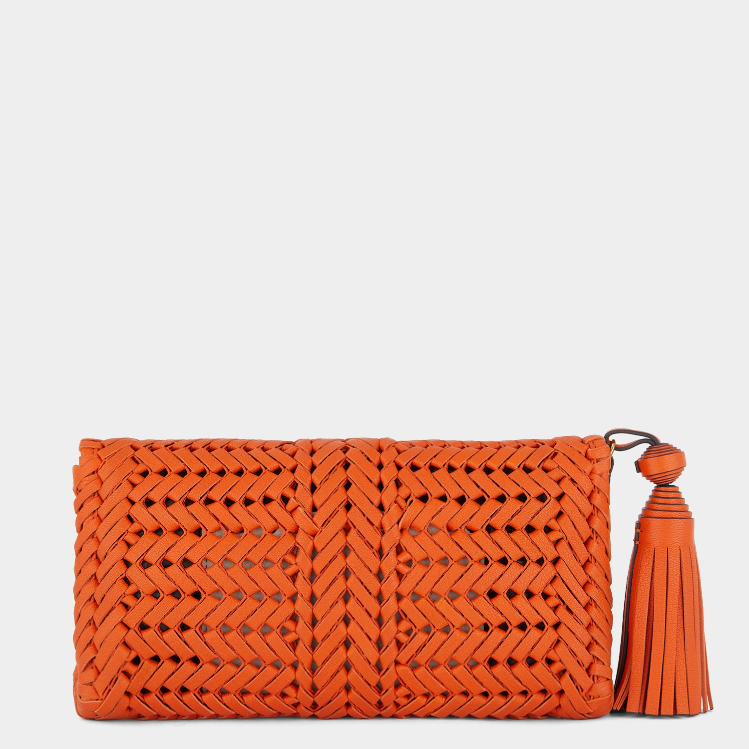 Neeson Tassel Clutch -

                  
                    Capra Leather in Ginger -
                  

                  Anya Hindmarch UK
