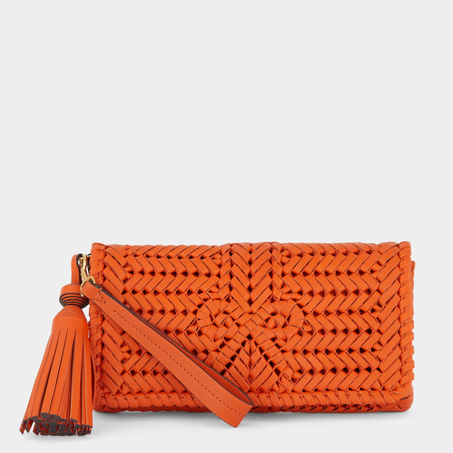 Neeson Tassel Clutch -

                  
                    Capra Leather in Ginger -
                  

                  Anya Hindmarch UK
