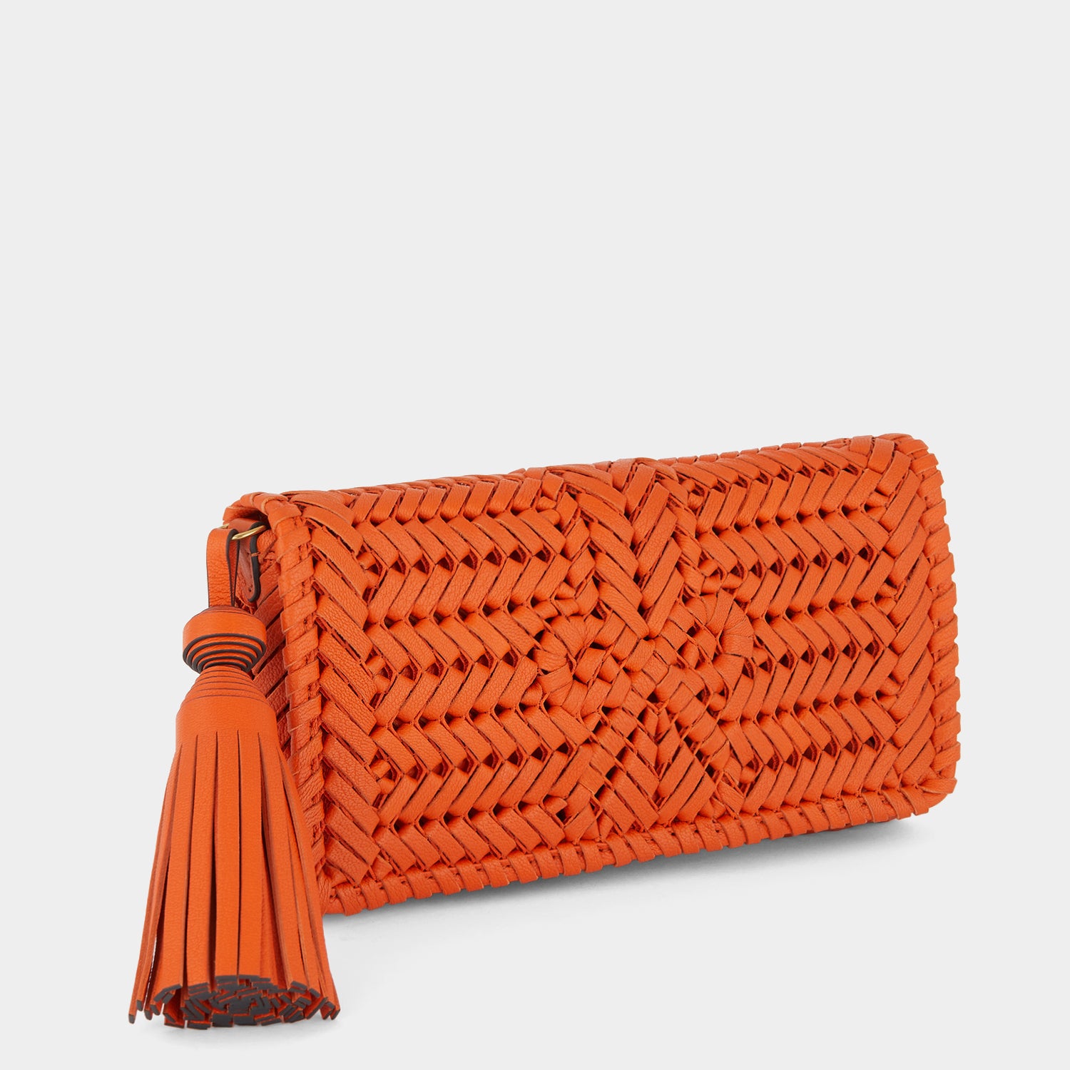Neeson Tassel Clutch -

                  
                    Capra Leather in Ginger -
                  

                  Anya Hindmarch UK
