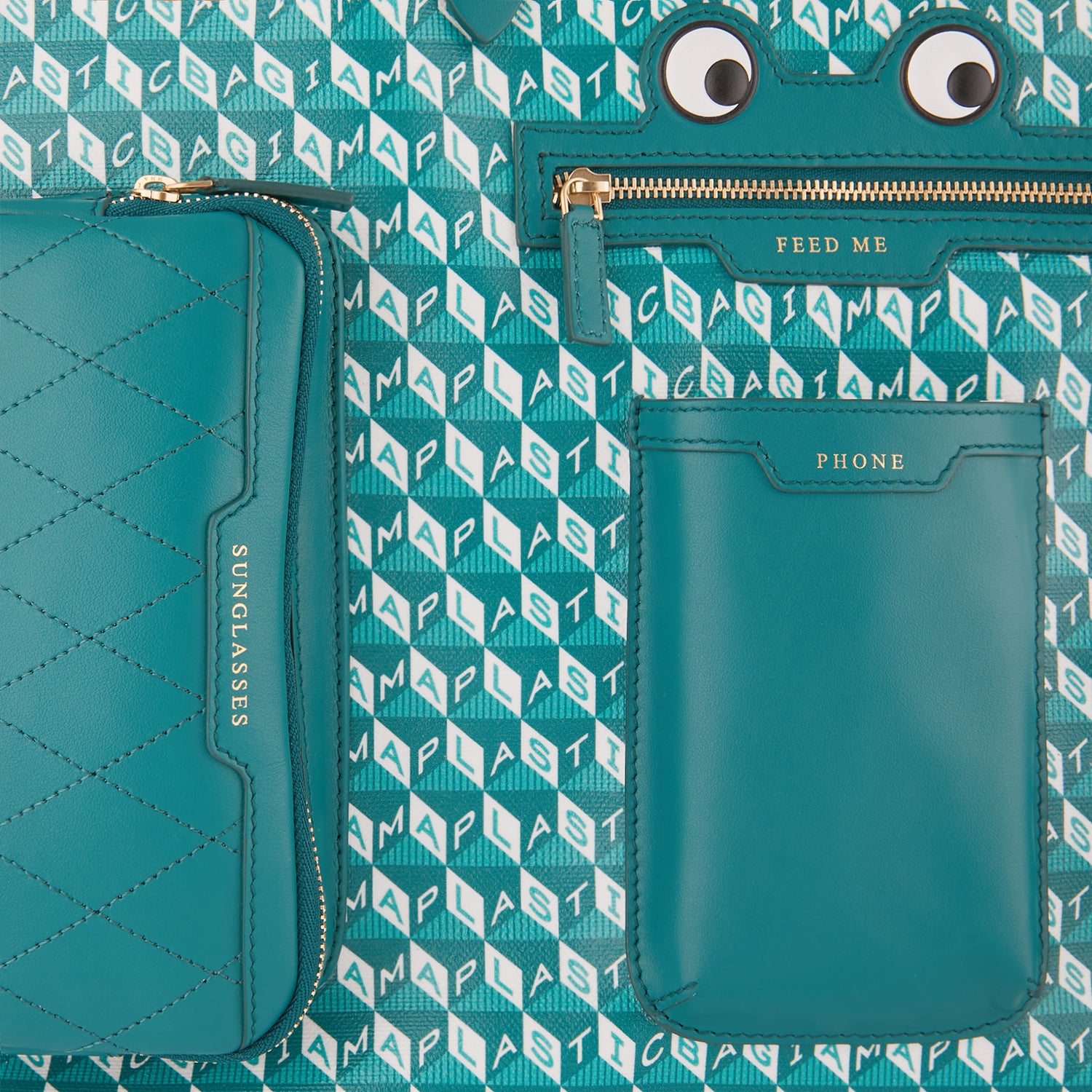 I am a Plastic Bag Tote XL Frog Multi Pocket Tote -

                  
                    Recycled Canvas in Viridian -
                  

                  Anya Hindmarch UK
