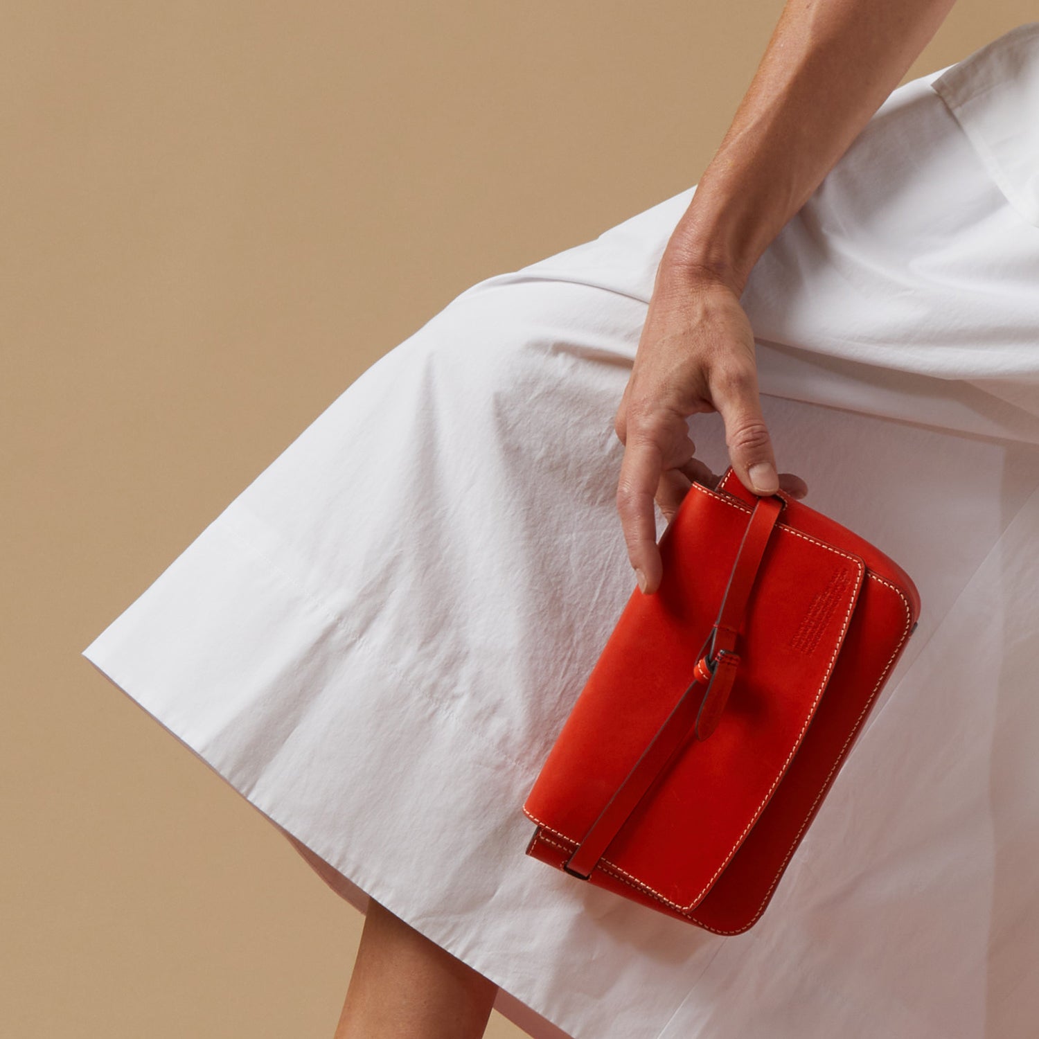 Return to Nature Clutch -

                  
                    Compostable Leather in Flame Red -
                  

                  Anya Hindmarch UK
