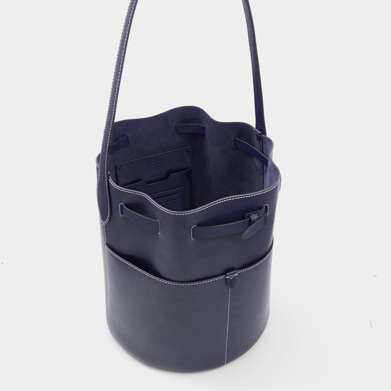 Return to Nature Bucket Bag -

                  
                    Compostable Leather in Marine -
                  

                  Anya Hindmarch UK
