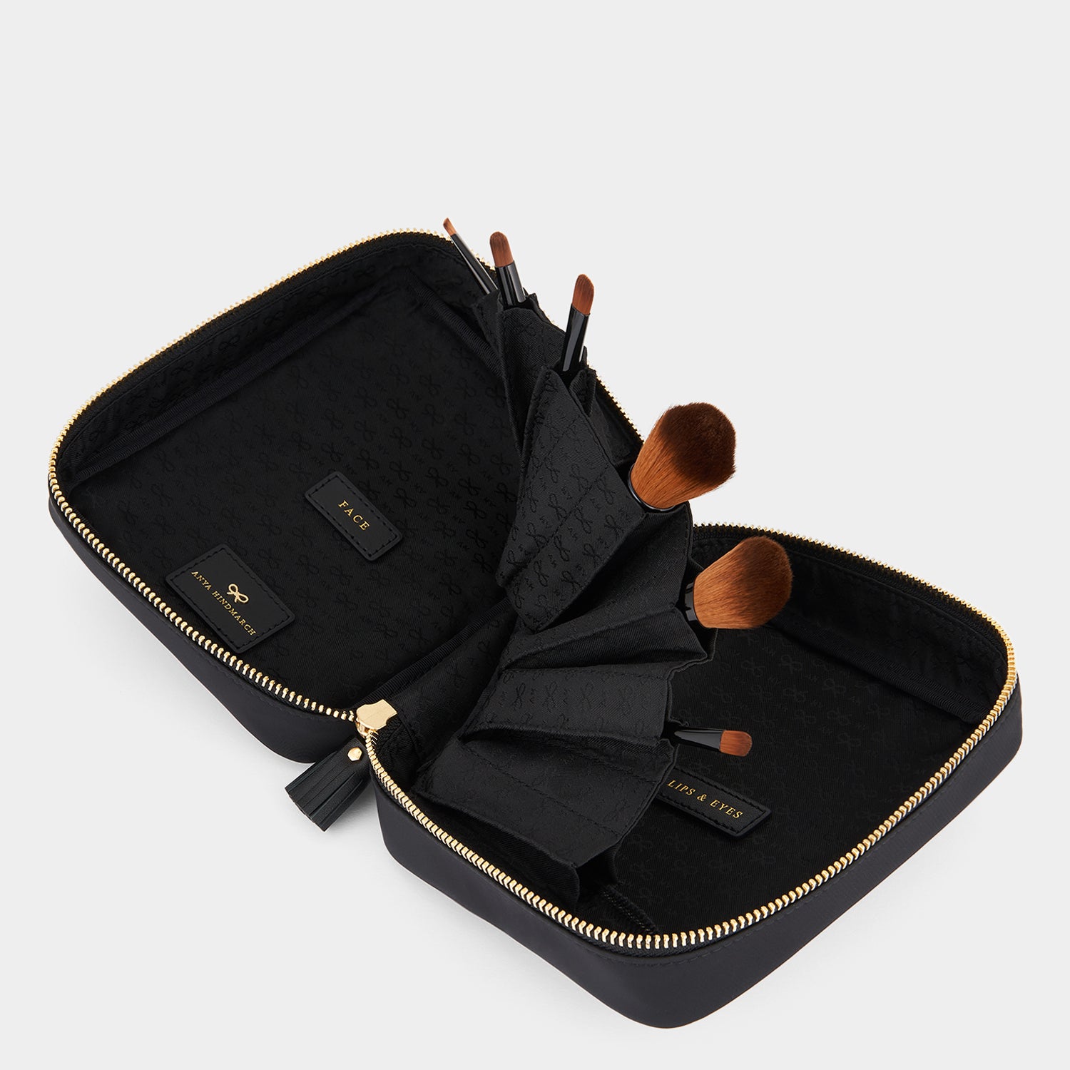 Make-Up Folio -

                  
                    Regenerated ECONYL® in Black -
                  

                  Anya Hindmarch UK
