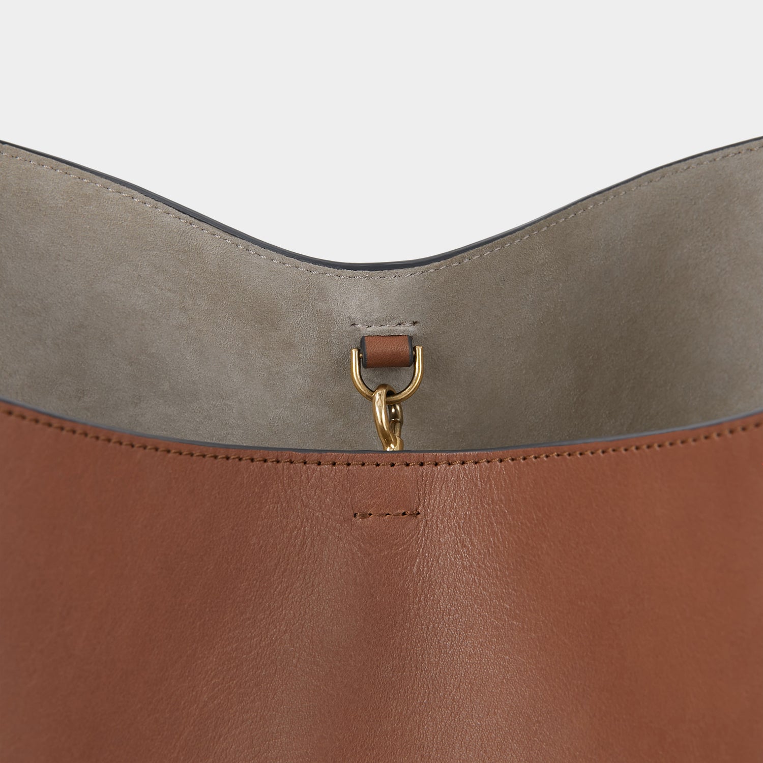 Nastro Small Hobo Bag -

                  
                    Flat Leather in Cedar -
                  

                  Anya Hindmarch UK
