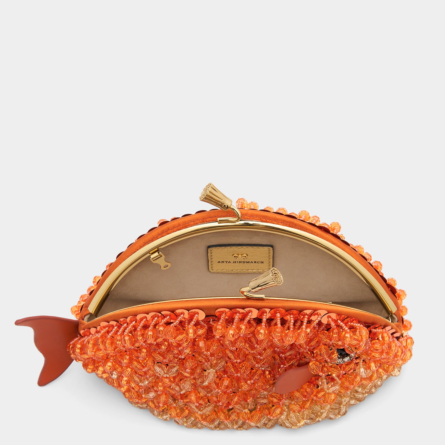 Fish Maud Tassel Clutch -

                  
                    Beads in Orange -
                  

                  Anya Hindmarch UK

