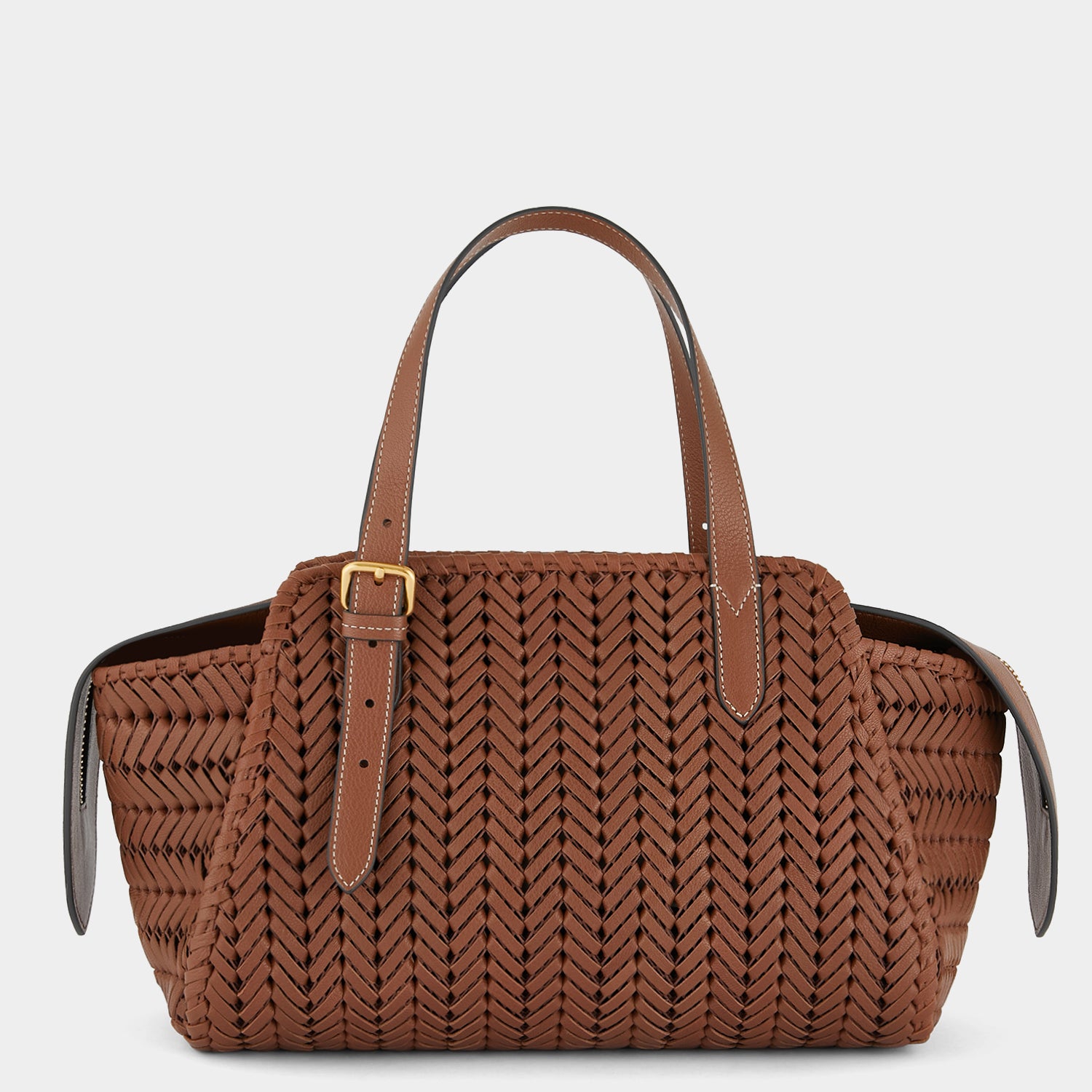 Neeson Zip Top Bag -

                  
                    Shiny Capra Leather in Cedar -
                  

                  Anya Hindmarch UK
