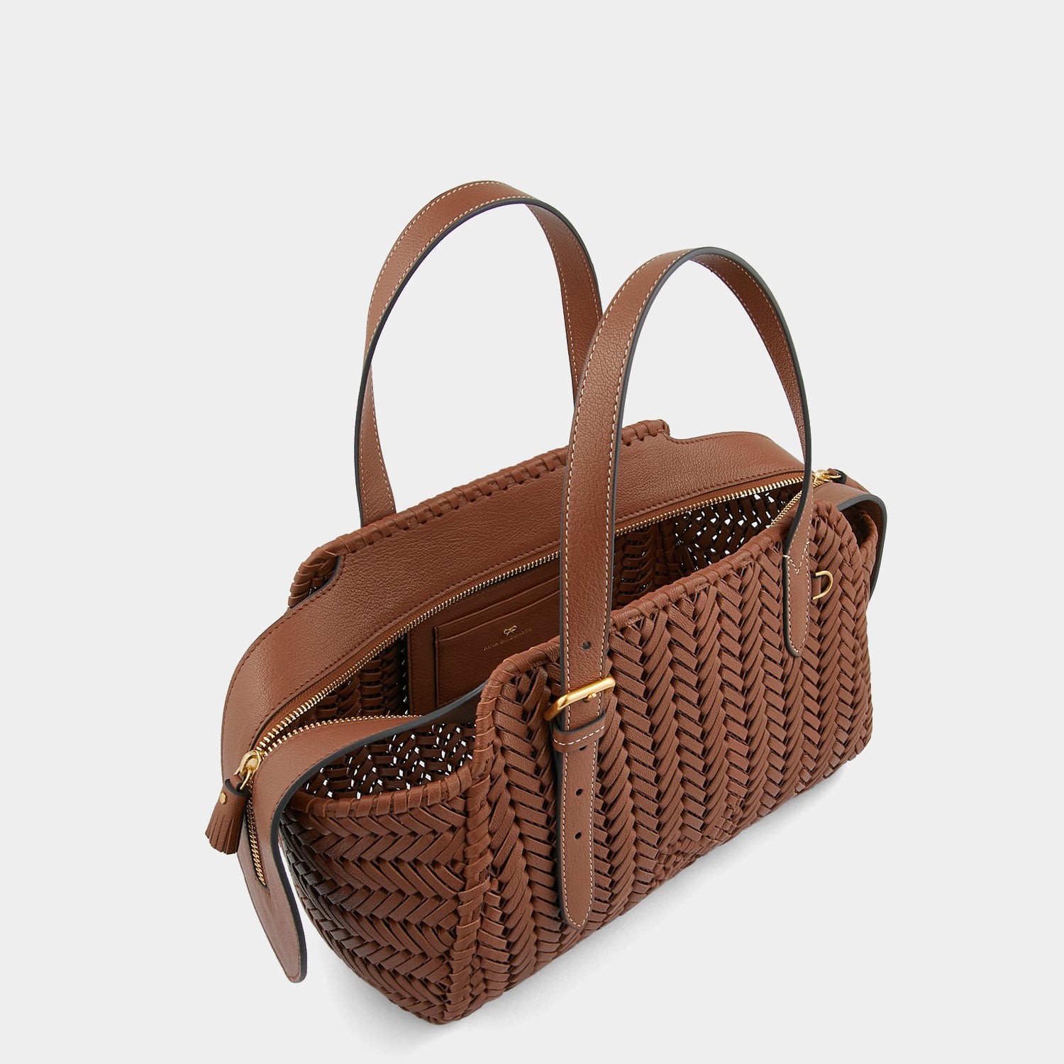 Neeson Zip Top Bag -

                  
                    Shiny Capra Leather in Cedar -
                  

                  Anya Hindmarch UK
