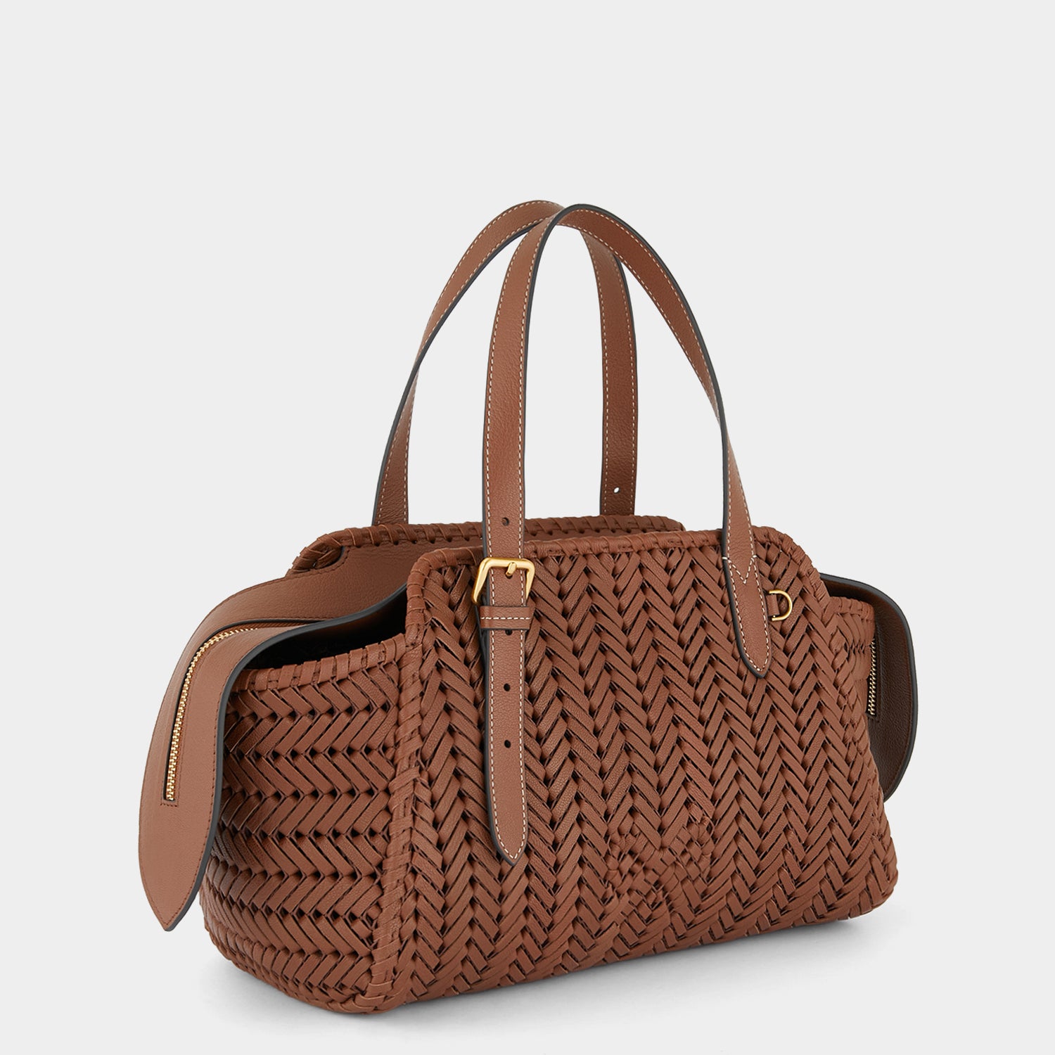 Neeson Zip Top Bag -

                  
                    Shiny Capra Leather in Cedar -
                  

                  Anya Hindmarch UK
