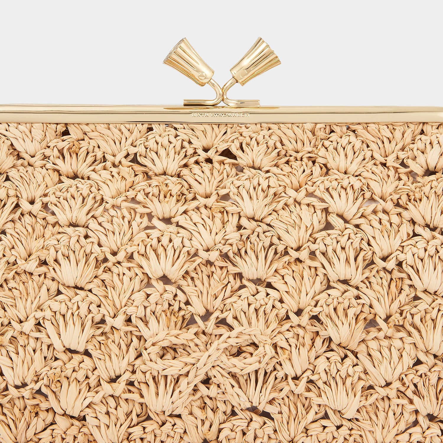 Large Maud Bow Clutch -

                  
                    Raffia in Natural -
                  

                  Anya Hindmarch UK
