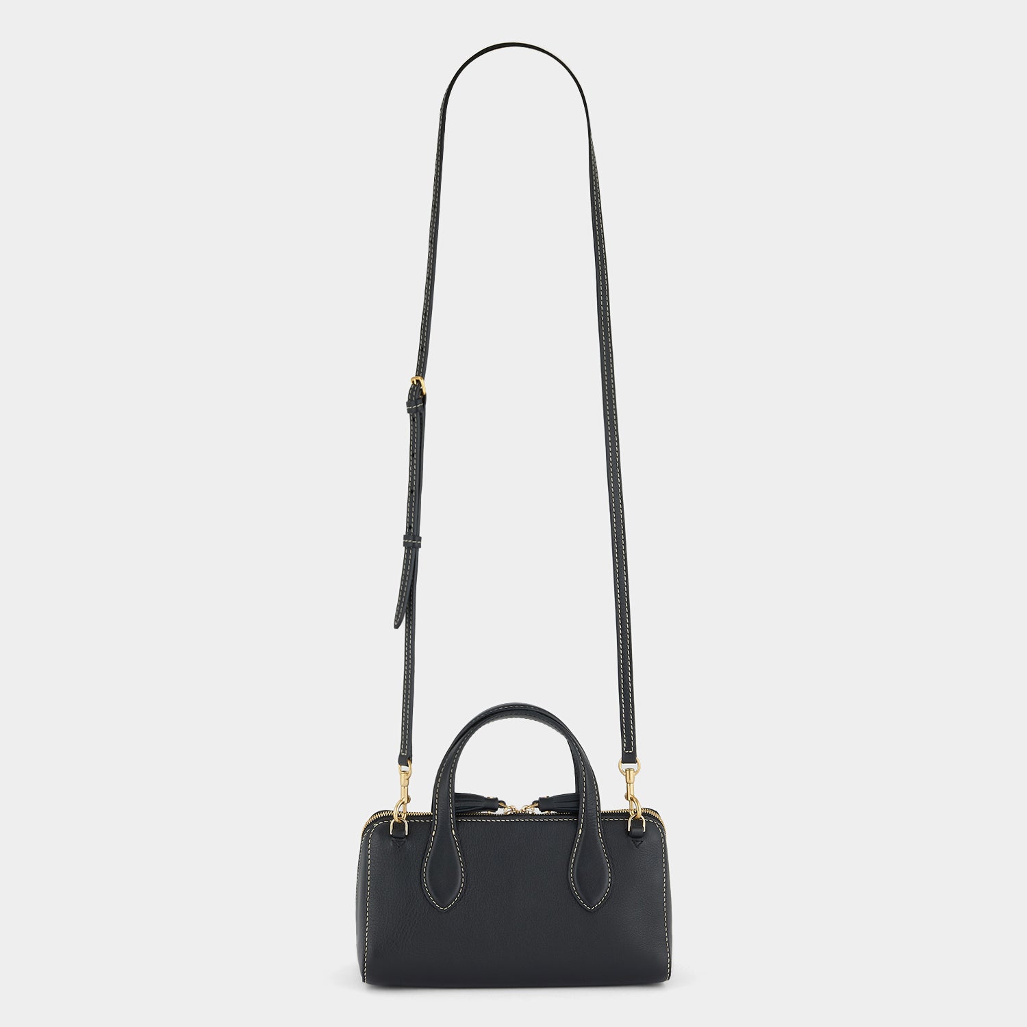 Small Wedge Cross-body -

                  
                    Calf Leather in Black -
                  

                  Anya Hindmarch UK
