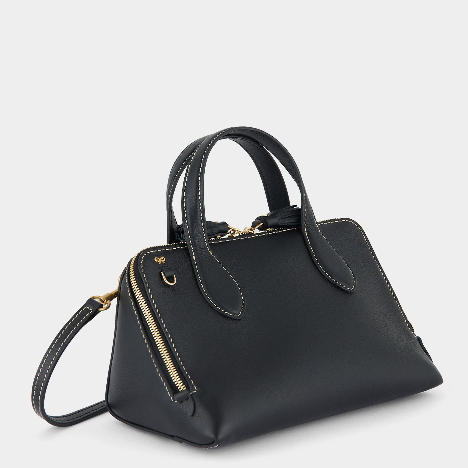 Small Wedge Cross-body -

                  
                    Calf Leather in Black -
                  

                  Anya Hindmarch UK
