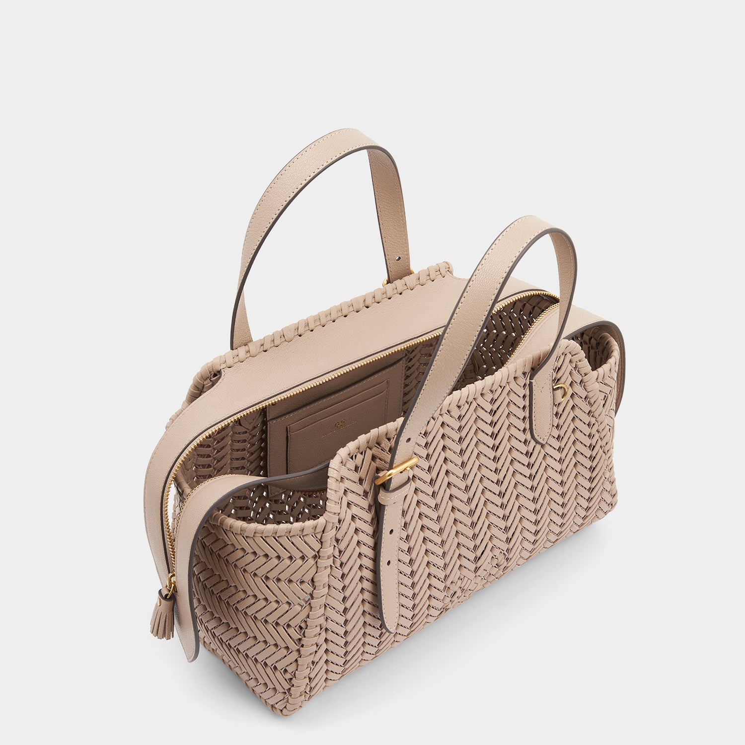 Neeson Zip Top Bag -

                  
                    Capra Leather in Light Nude -
                  

                  Anya Hindmarch UK

