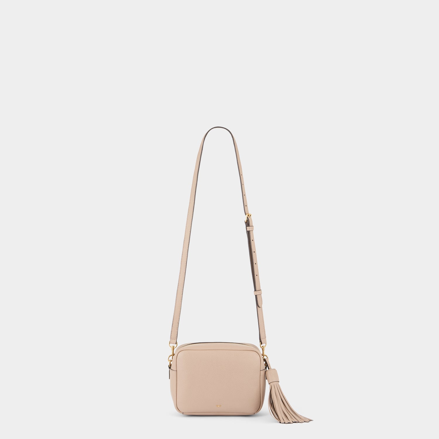 Neeson Tassel Cross-body -

                  
                    Capra Leather in Light Nude -
                  

                  Anya Hindmarch UK
