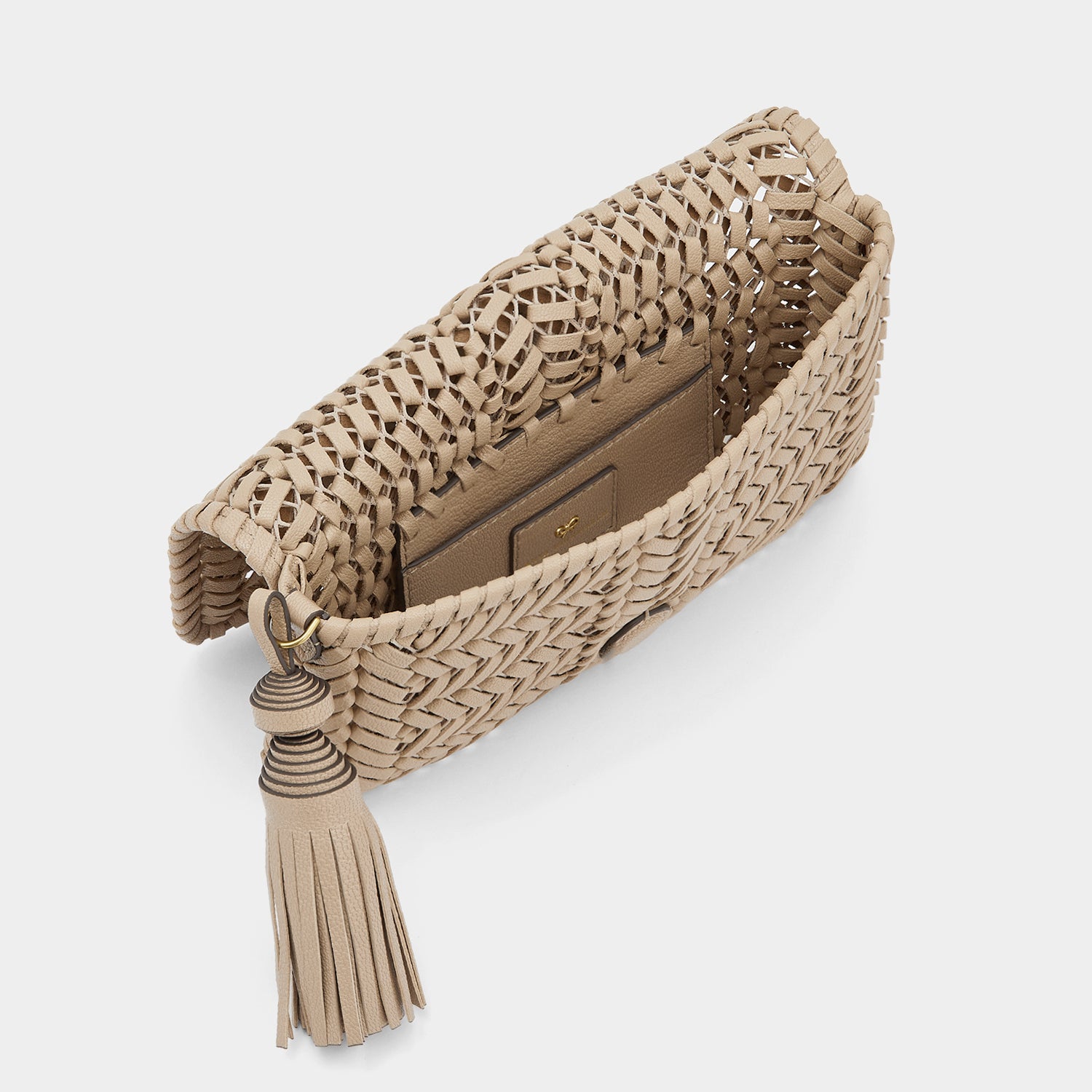 Neeson Tassel Clutch -

                  
                    Capra Leather in Light Nude -
                  

                  Anya Hindmarch UK
