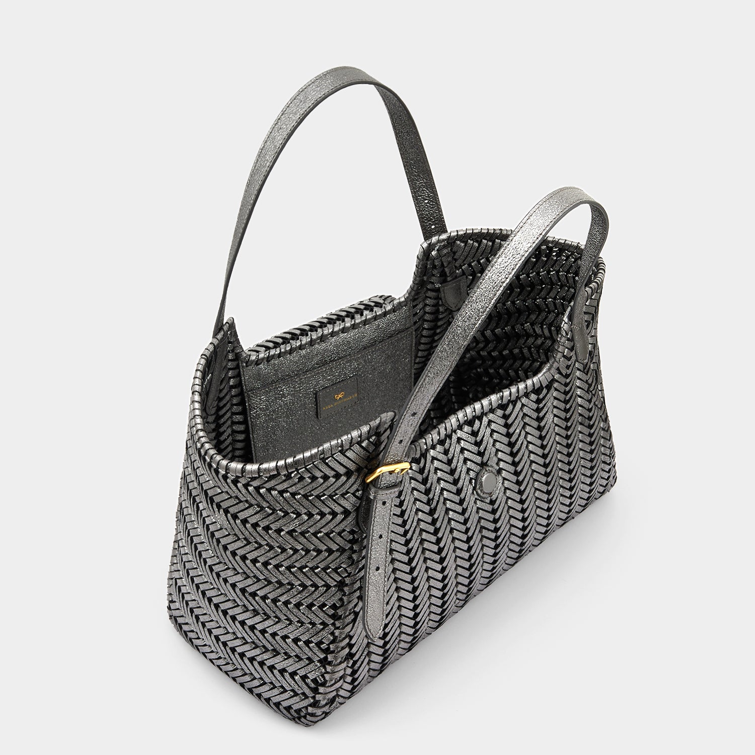 Neeson Tassel Tote -

                  
                    Metallic Leather in Anthracite -
                  

                  Anya Hindmarch UK
