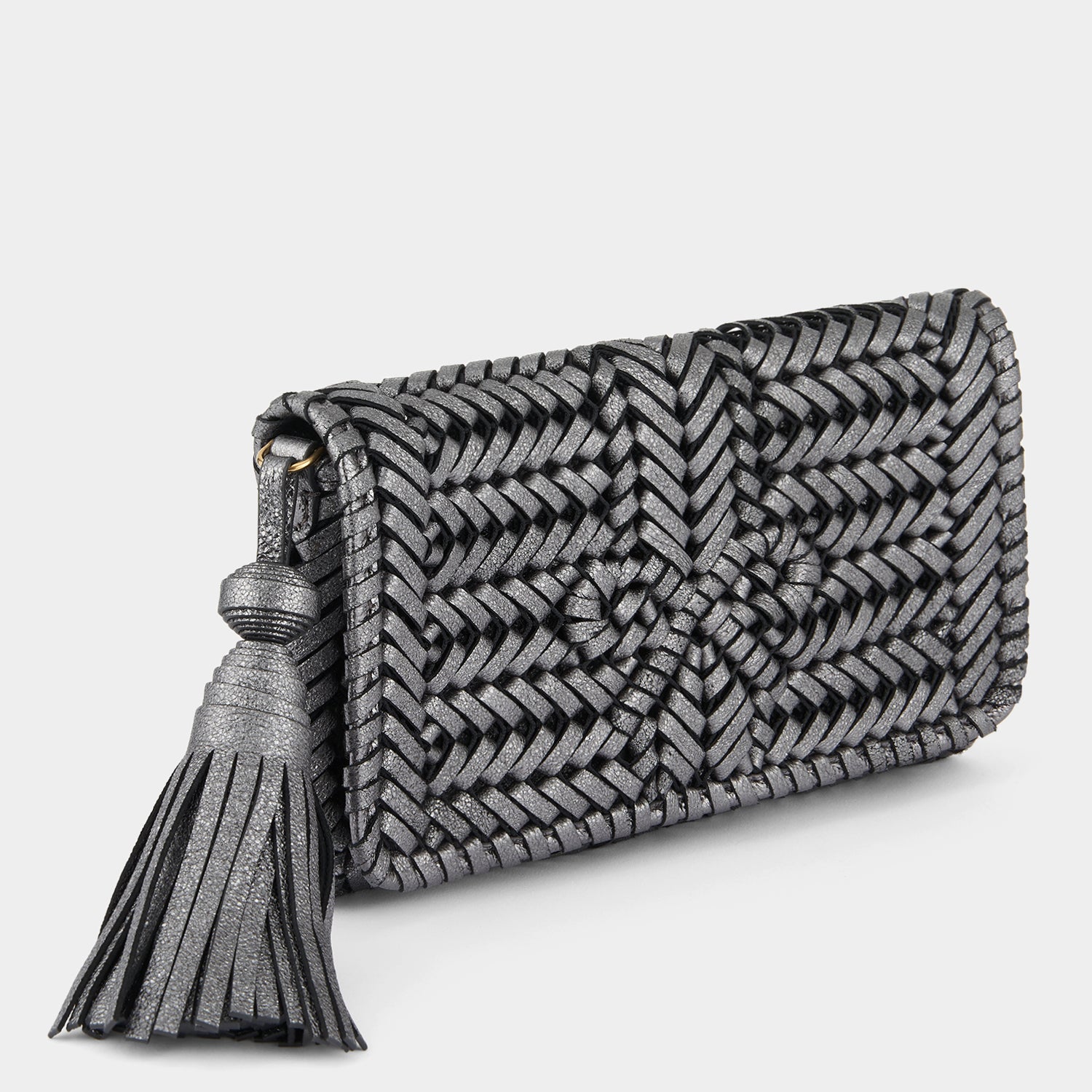 Neeson Tassel Clutch -

                  
                    Metallic Leather in Anthracite -
                  

                  Anya Hindmarch UK
