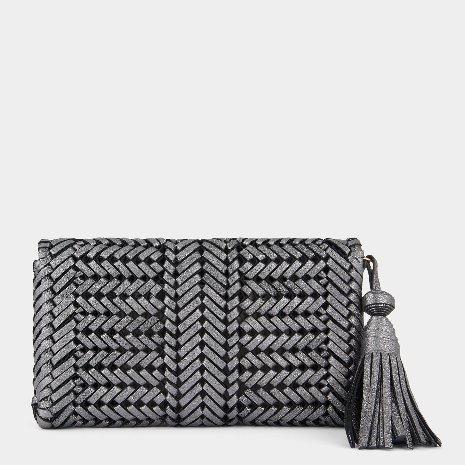 Neeson Tassel Clutch -

                  
                    Metallic Leather in Anthracite -
                  

                  Anya Hindmarch UK
