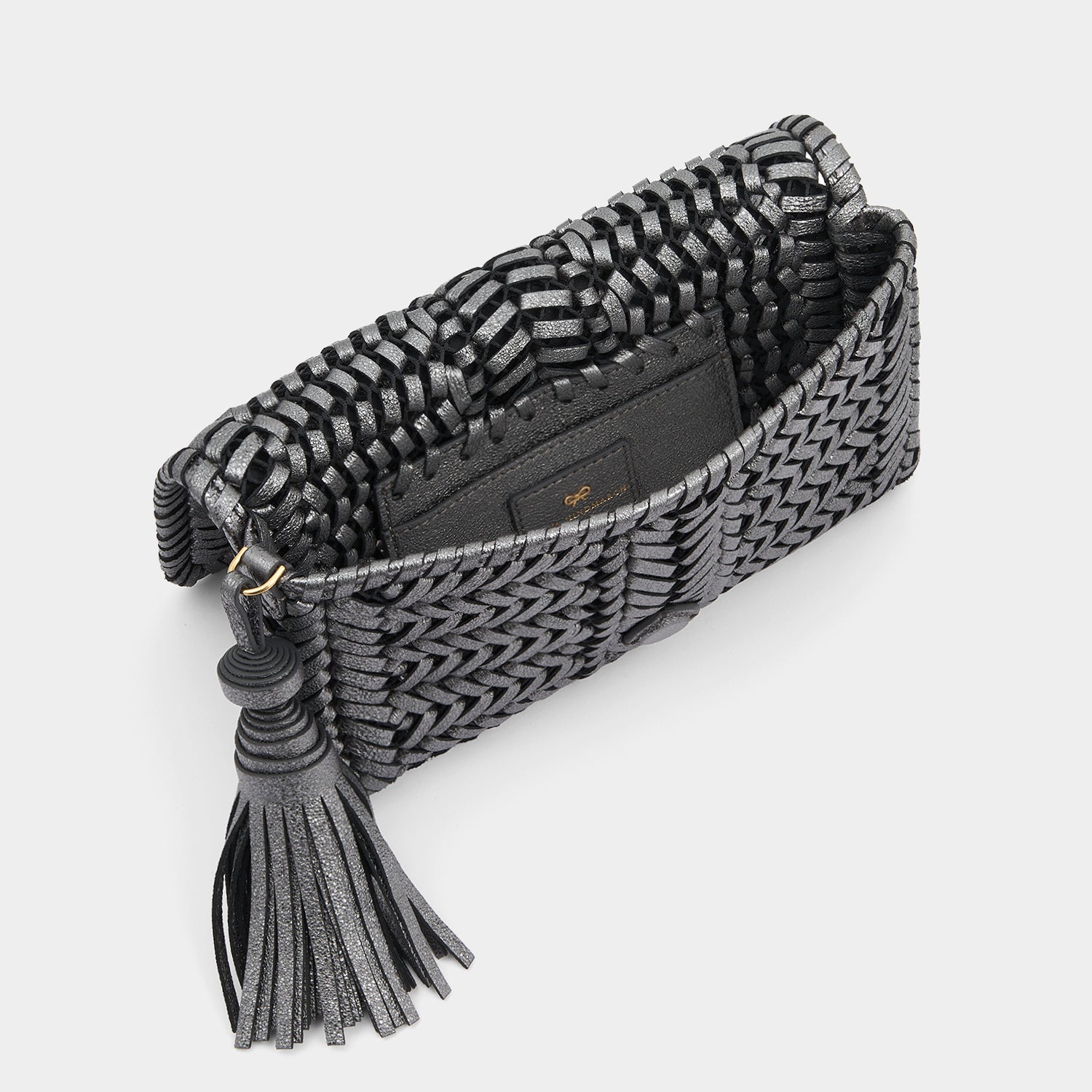 Neeson Tassel Clutch -

                  
                    Metallic Leather in Anthracite -
                  

                  Anya Hindmarch UK
