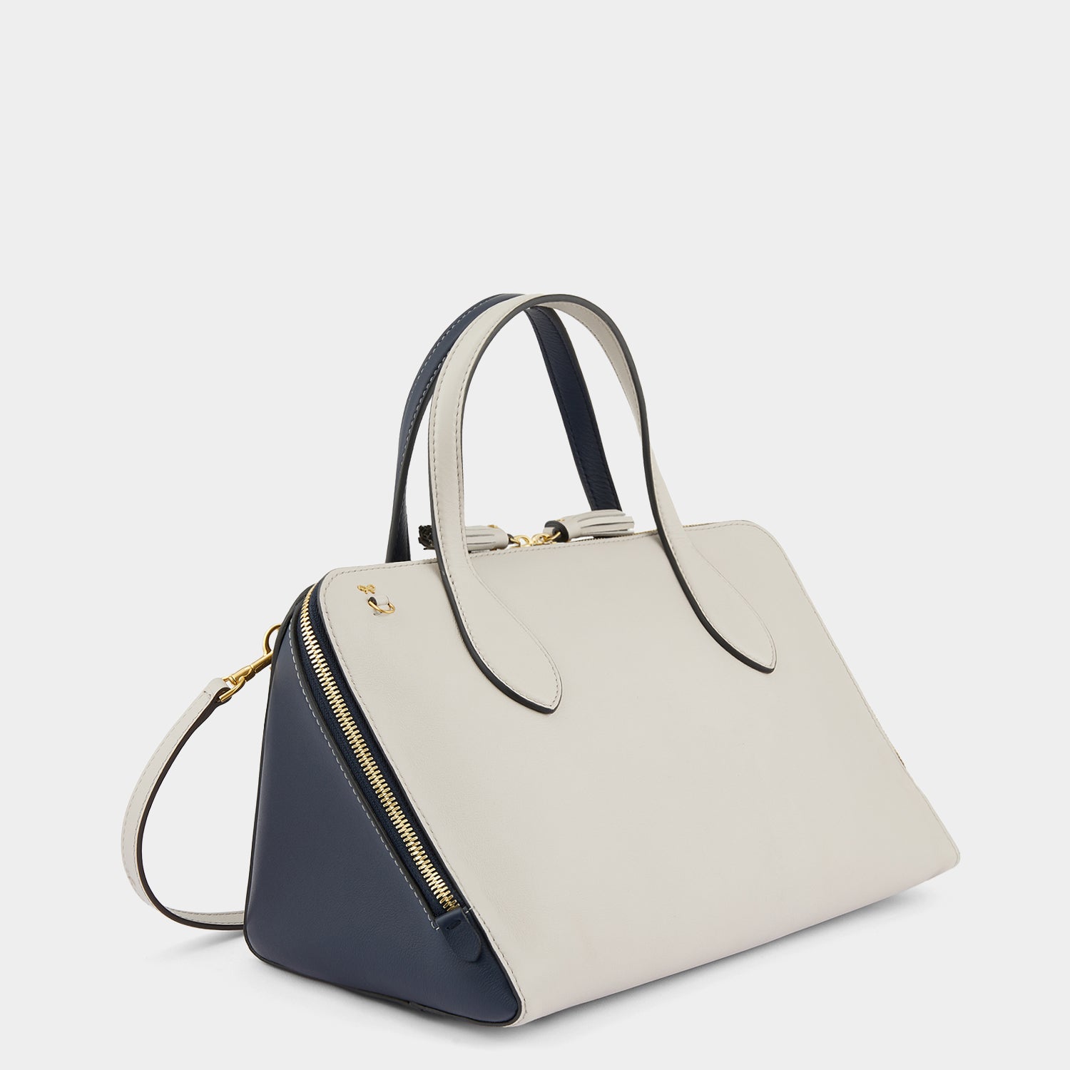 Wedge Cross-body -

                  
                    Calf Leather in Steam -
                  

                  Anya Hindmarch UK
